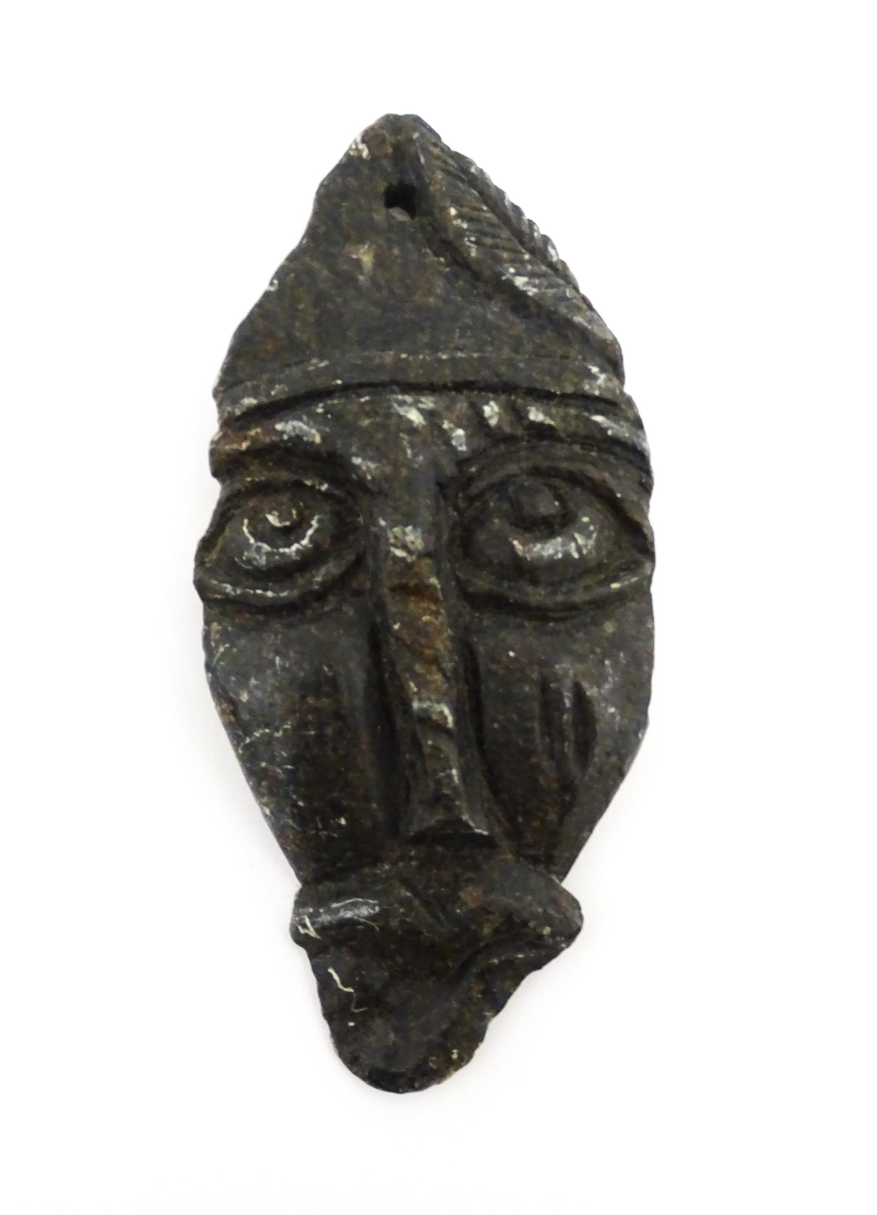 Ethnographic / Native / Tribal : Three African carved soapstone amulets / talisman of mask form. - Image 4 of 5