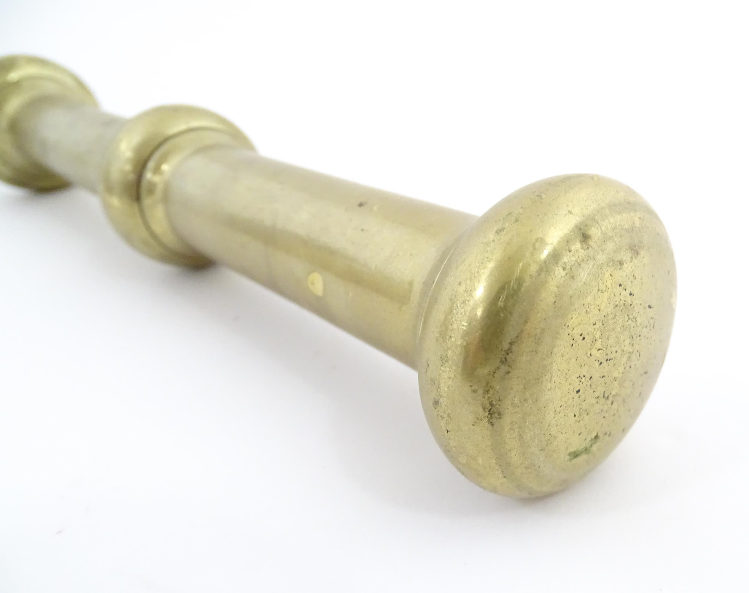 A 19thC brass pestle and mortar, the mortar of tapering form with twin rectangular handles. Mortar - Image 13 of 14