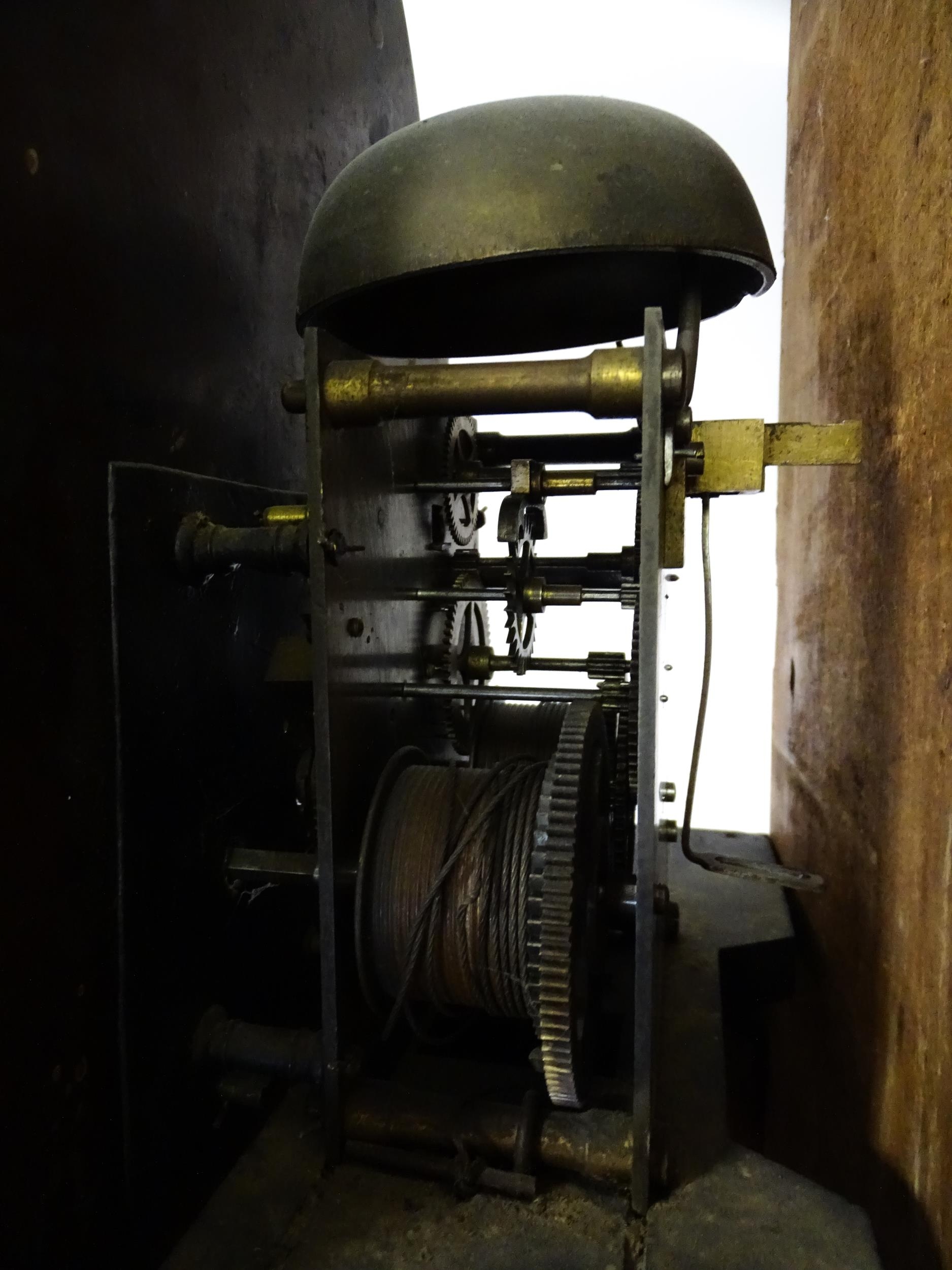 A 19thC oak cased 8-day longcase clock. The painted arch dial signed Foster Guildford. The case with - Image 9 of 10