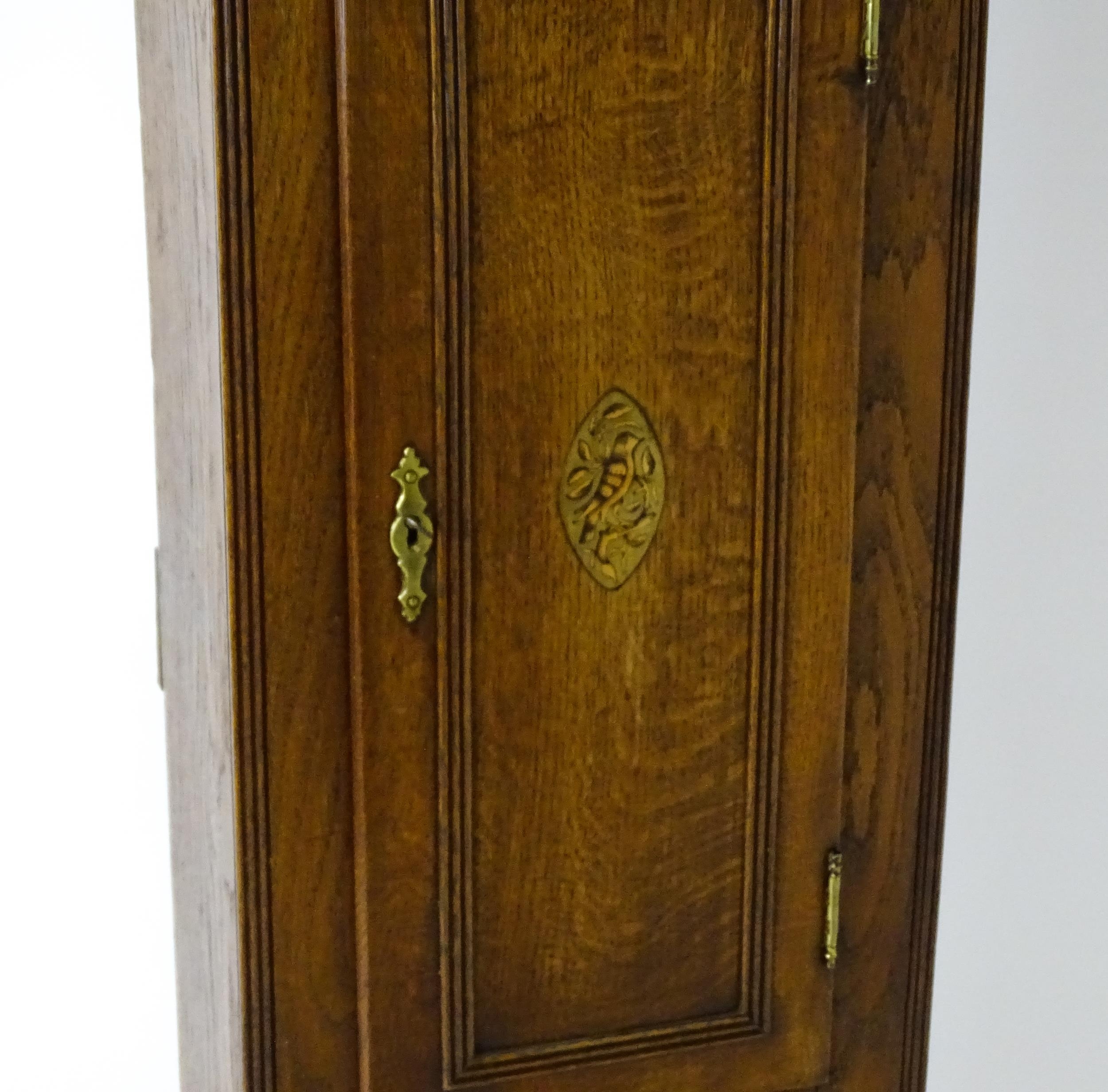 A 19thC oak cased 8-day longcase clock. The painted arch dial signed Foster Guildford. The case with - Image 5 of 10