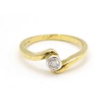 A 9ct gold ring set with central diamond. Ring size approx. O 1/2 Please Note - we do not make