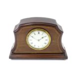 An early 20thC French mahogany cased mantle clock with white enamel dial and movement by