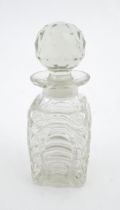 A Victorian glass hunting decanter with stylised horse shoe decoration to sides. Approx. 6" high