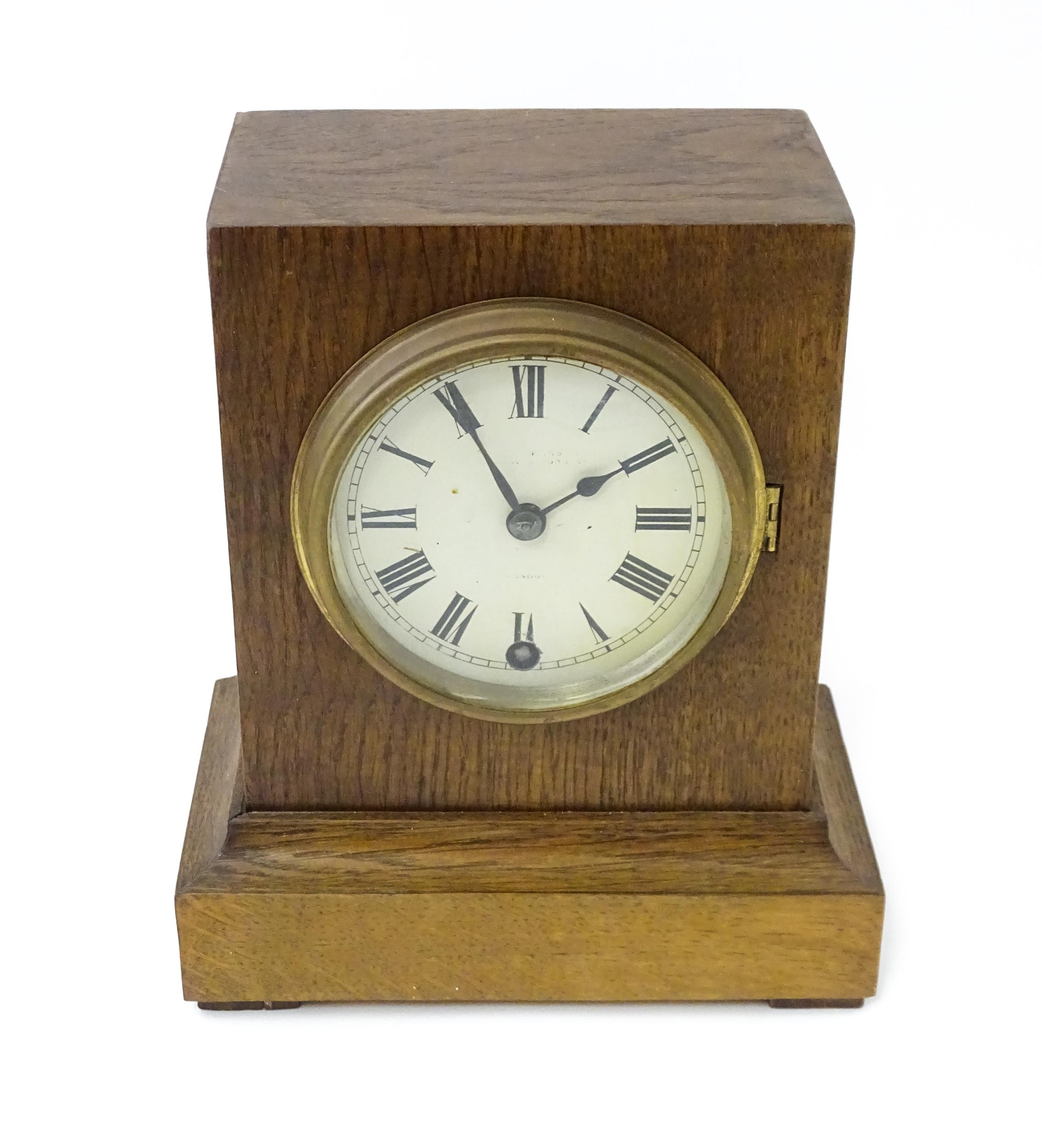 A 20thC oak cased mantle clock bearing label for Camerer, Kuss & Co. Approx. 9 1/4" high Please Note - Image 12 of 13