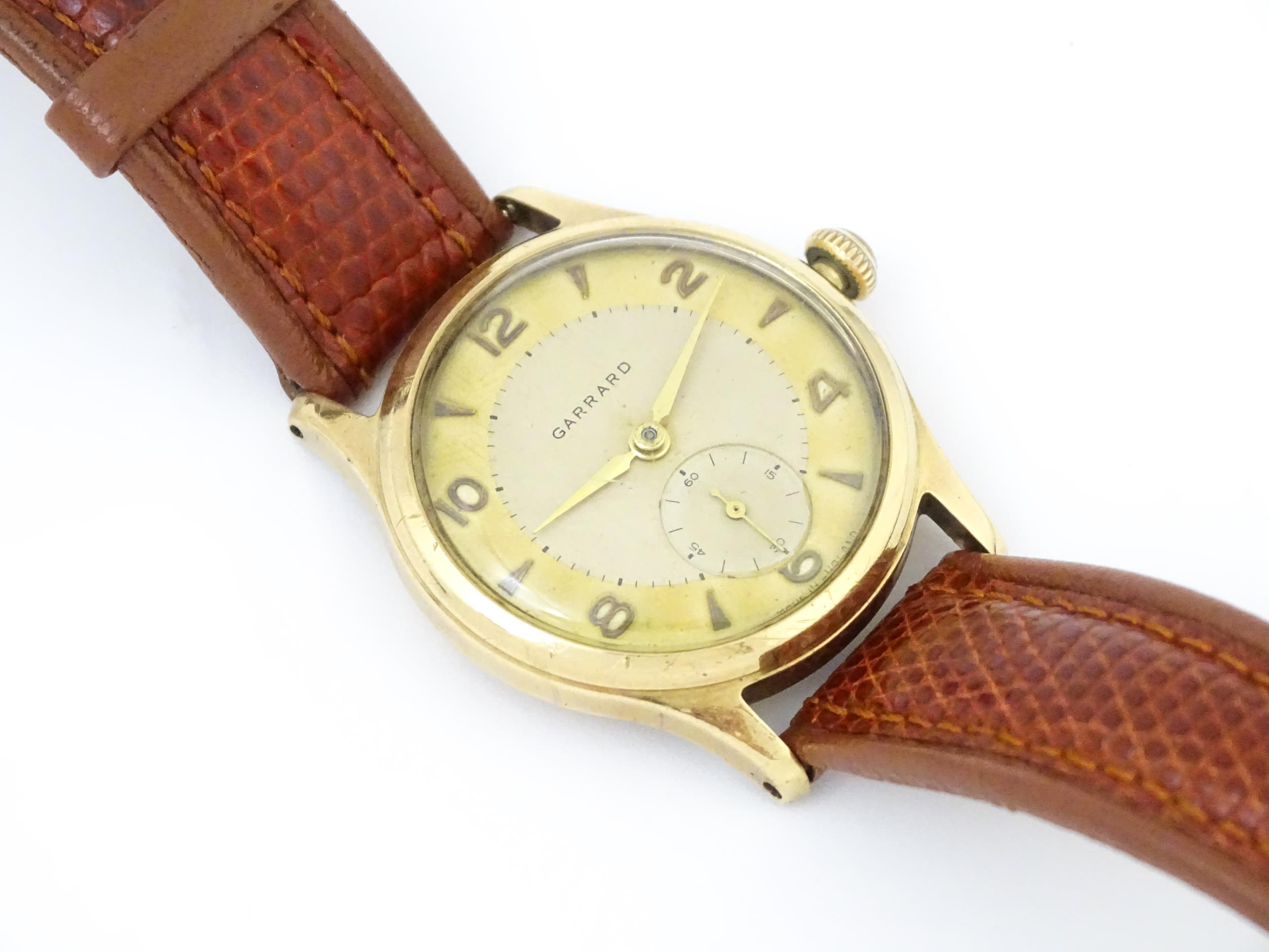 A gentlemans 9ct gold cased wristwatch the dial signed Garrard with Arabic numerals and subsidiary - Bild 11 aus 11