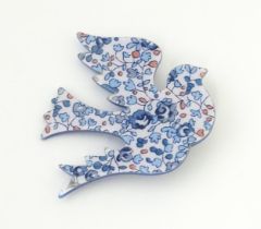 Lea Stein Paris : A brooch formed as a dove / bird with floral detail. Approx. 2 1/4" high Please