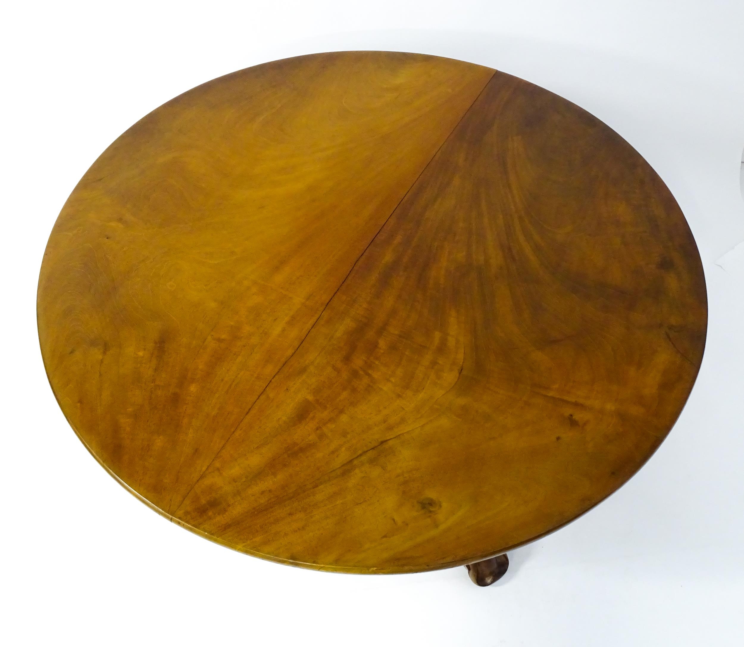 A 19thC mahogany tilt top breakfast table with a carved frieze above a turned and carved pedestal - Image 2 of 11