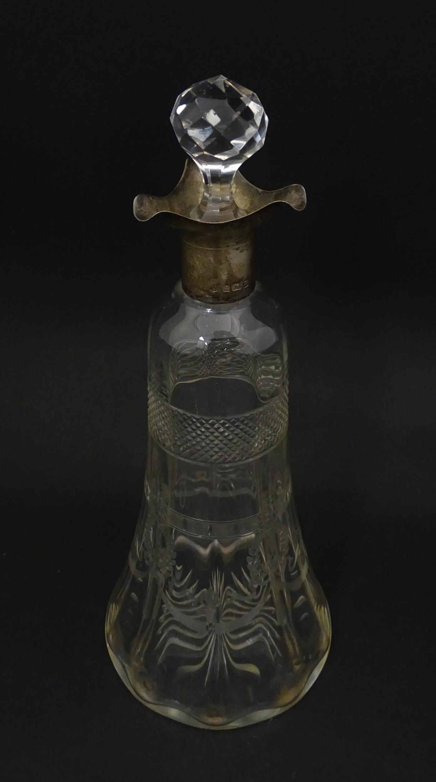 A cut glass decanter with silver mounts hallmarked Birmingham 1911. Approx. 9 1/4" high Please - Image 2 of 9