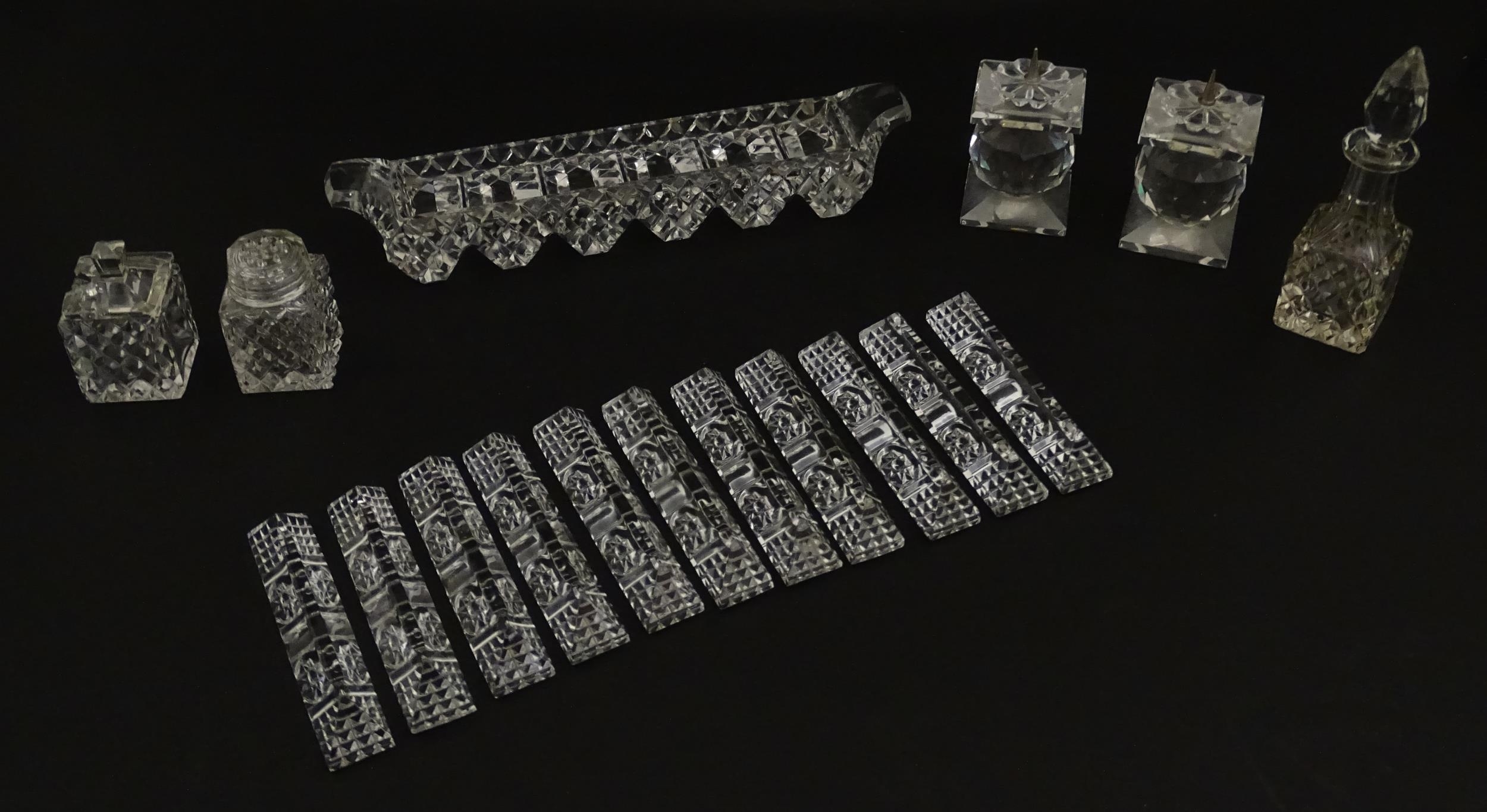 Assorted glass items to include eleven knife rests, cruet, and candle stands of pricket form by - Image 4 of 15