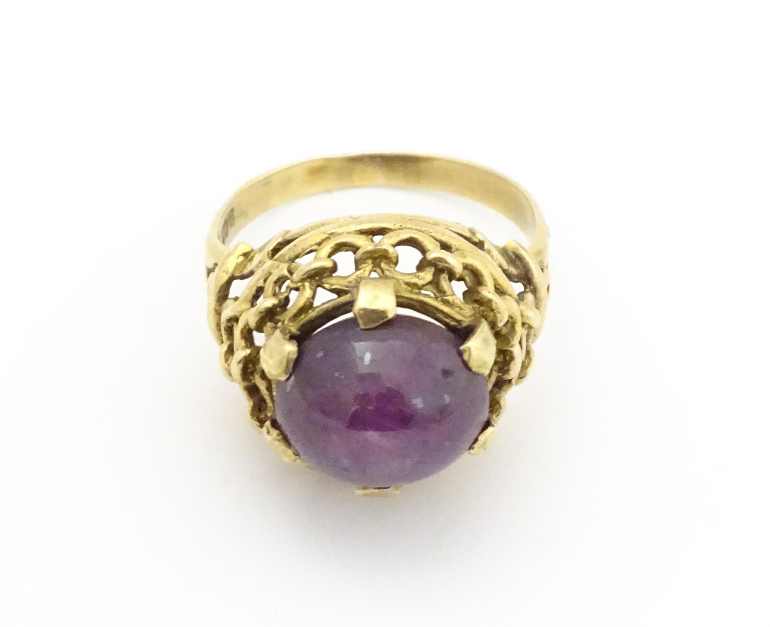 A 9ct gold ring set with ruby cabochon. Ring size approx. O Please Note - we do not make reference - Image 2 of 9