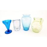Four items of 20thC glassware to include a Uranium jug, a blue ice glass vase, a Swedish vase by