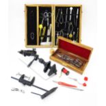 Fishing : a quantity of fly tying tools, to include two cases containing scissors, pliers, cotton,