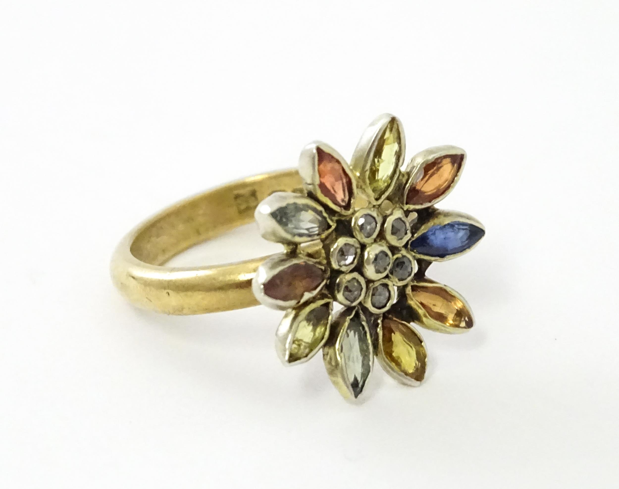 A 9ct gold ring set with central diamonds bordered by various coloured stones in a flower setting. - Image 3 of 6