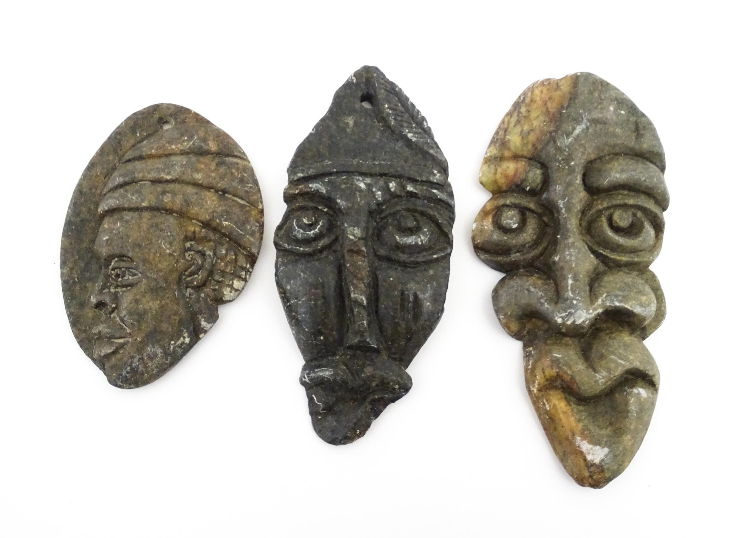 Ethnographic / Native / Tribal : Three African carved soapstone amulets / talisman of mask form.