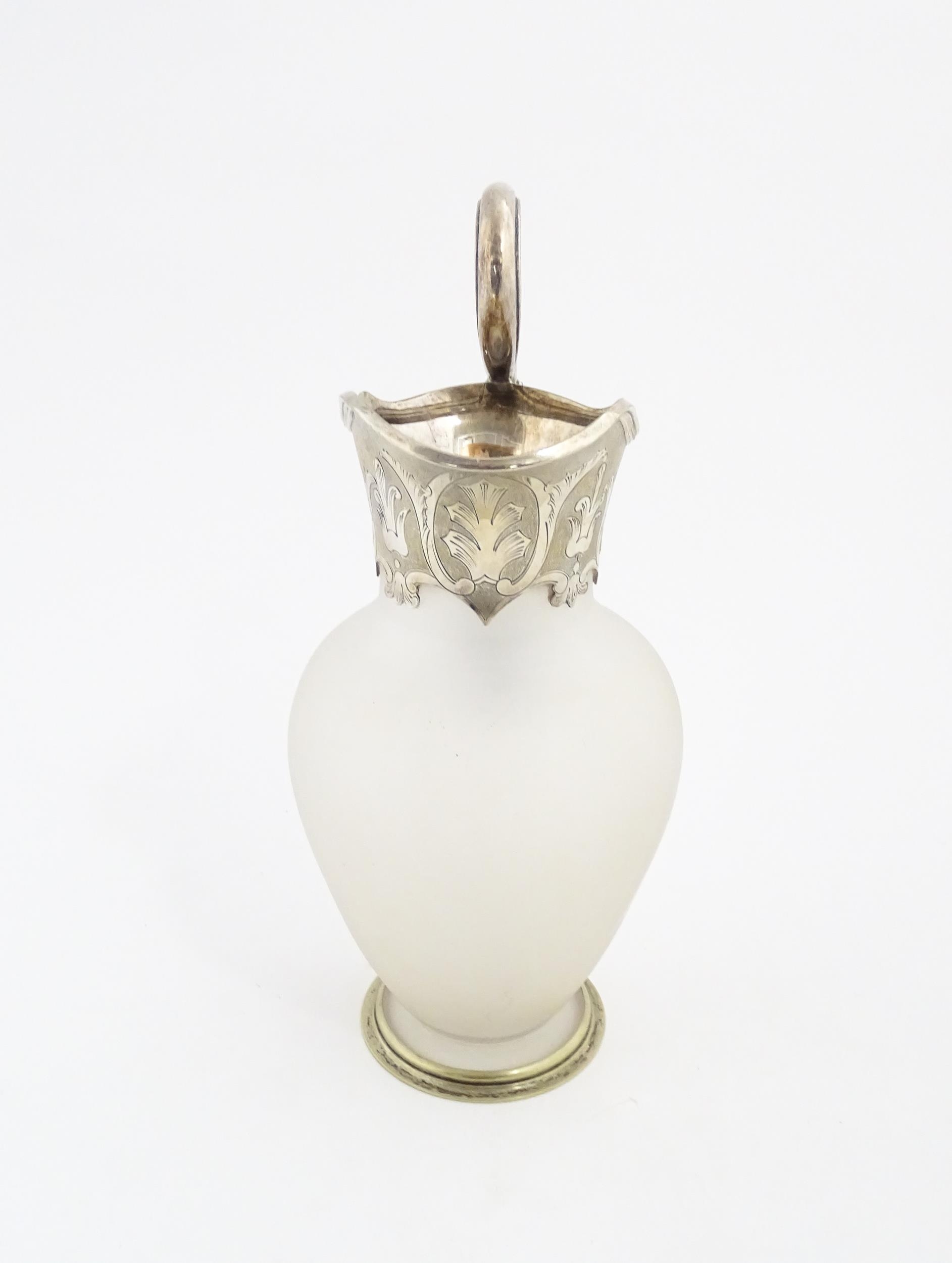 A Victorian frosted glass jug of ewer form with silver plate handle and mounts. Approx. 11 1/2" high - Image 3 of 6