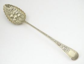 A silver berry spoon, hallmarked London 1794, maker Stephen Adams. Approx 12" long (96g) Please Note