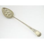 A silver berry spoon, hallmarked London 1794, maker Stephen Adams. Approx 12" long (96g) Please Note