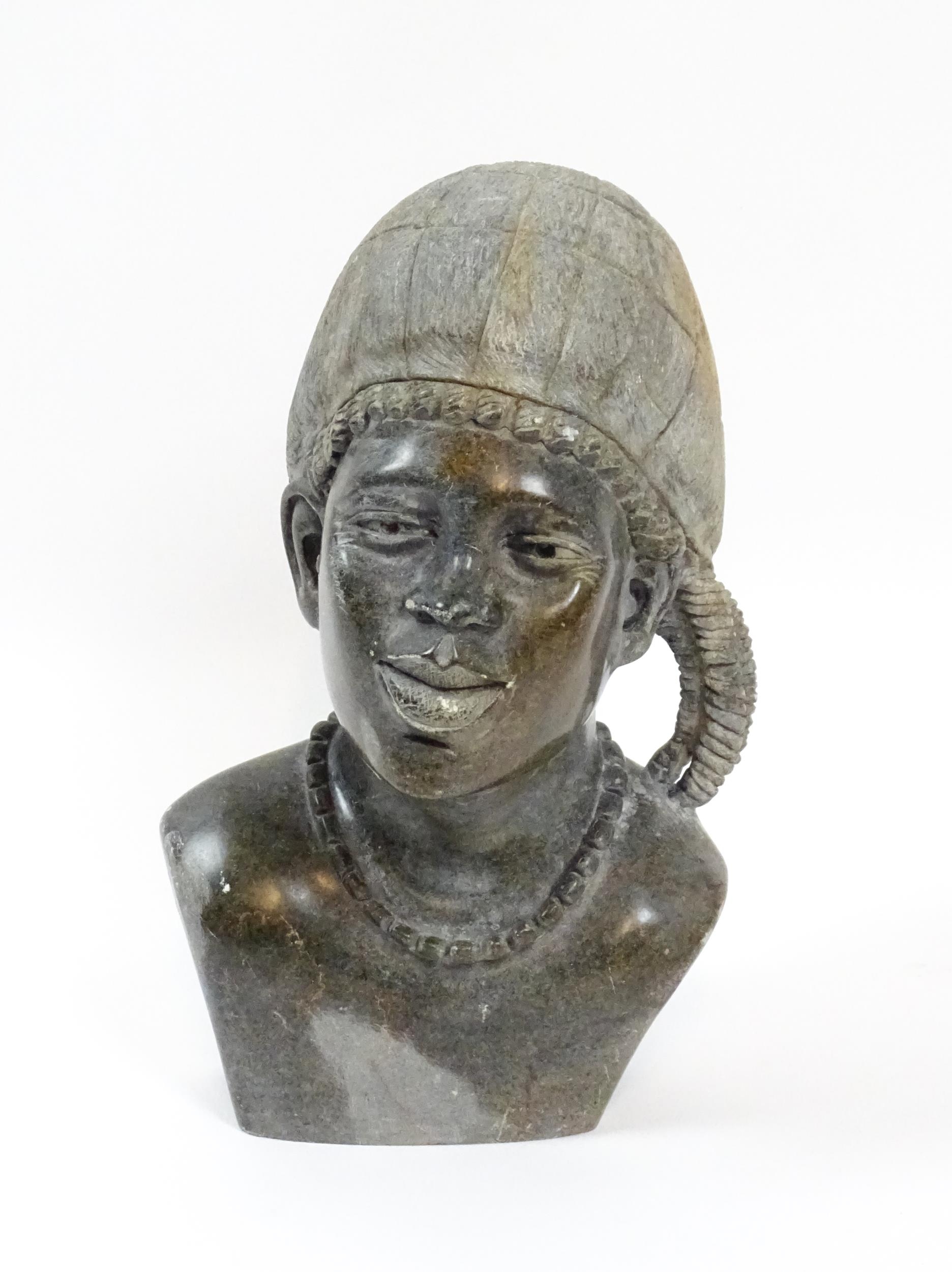 Ethnographic / Native / Tribal : An African carved soapstone bust modelled as a woman wearing a - Image 3 of 6