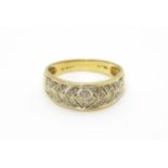 A 14ct gold ring set with diamonds. Ring size approx. P 1/2 Please Note - we do not make reference