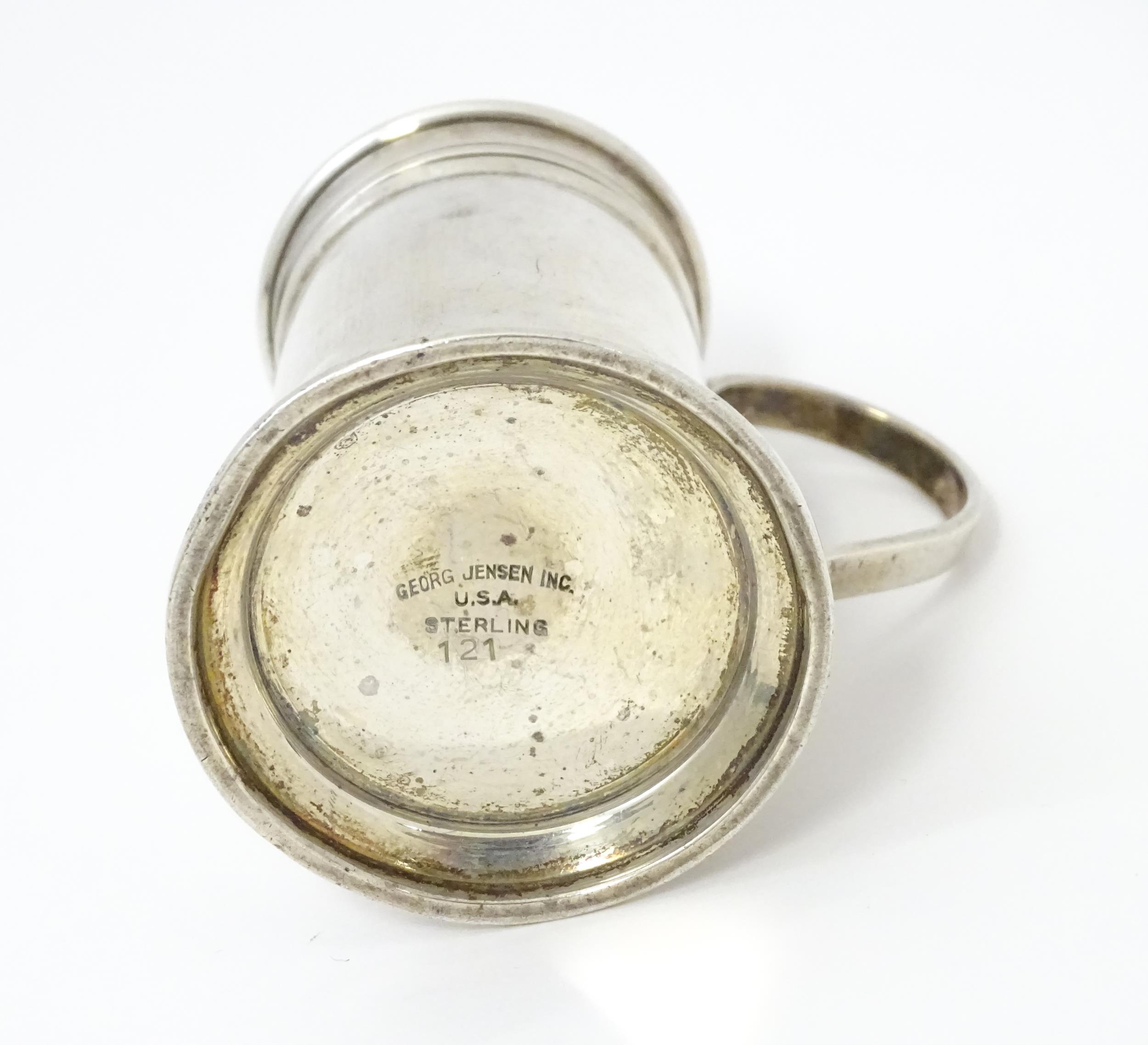 An American sterling silver pepperette modelled as a flour shaker. Marked under Georg Jensen Inc, - Image 8 of 8