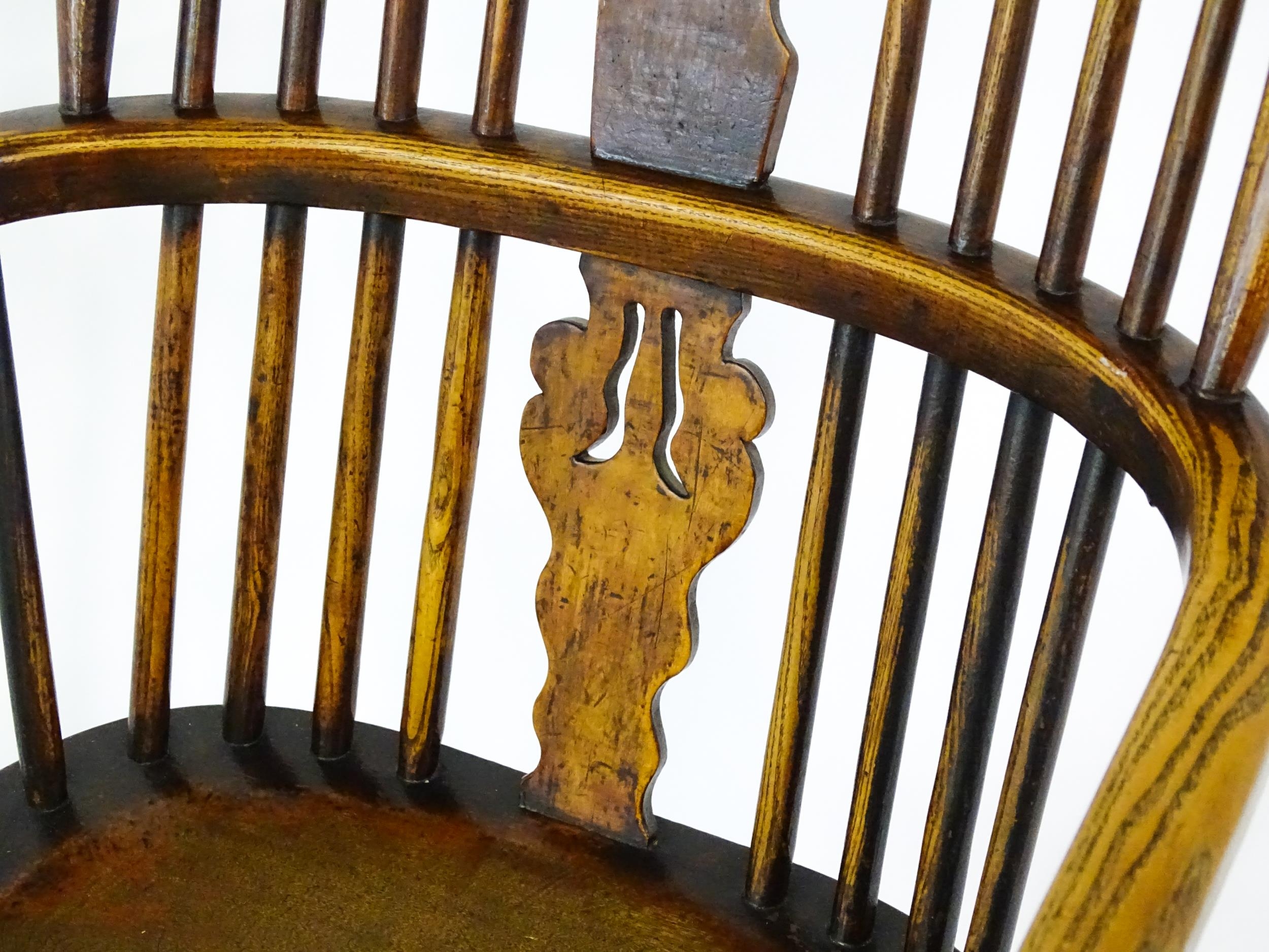 A mid 19thC ash and elm Windsor chair with a double bowed backrest and a pierced back splat above - Image 6 of 9