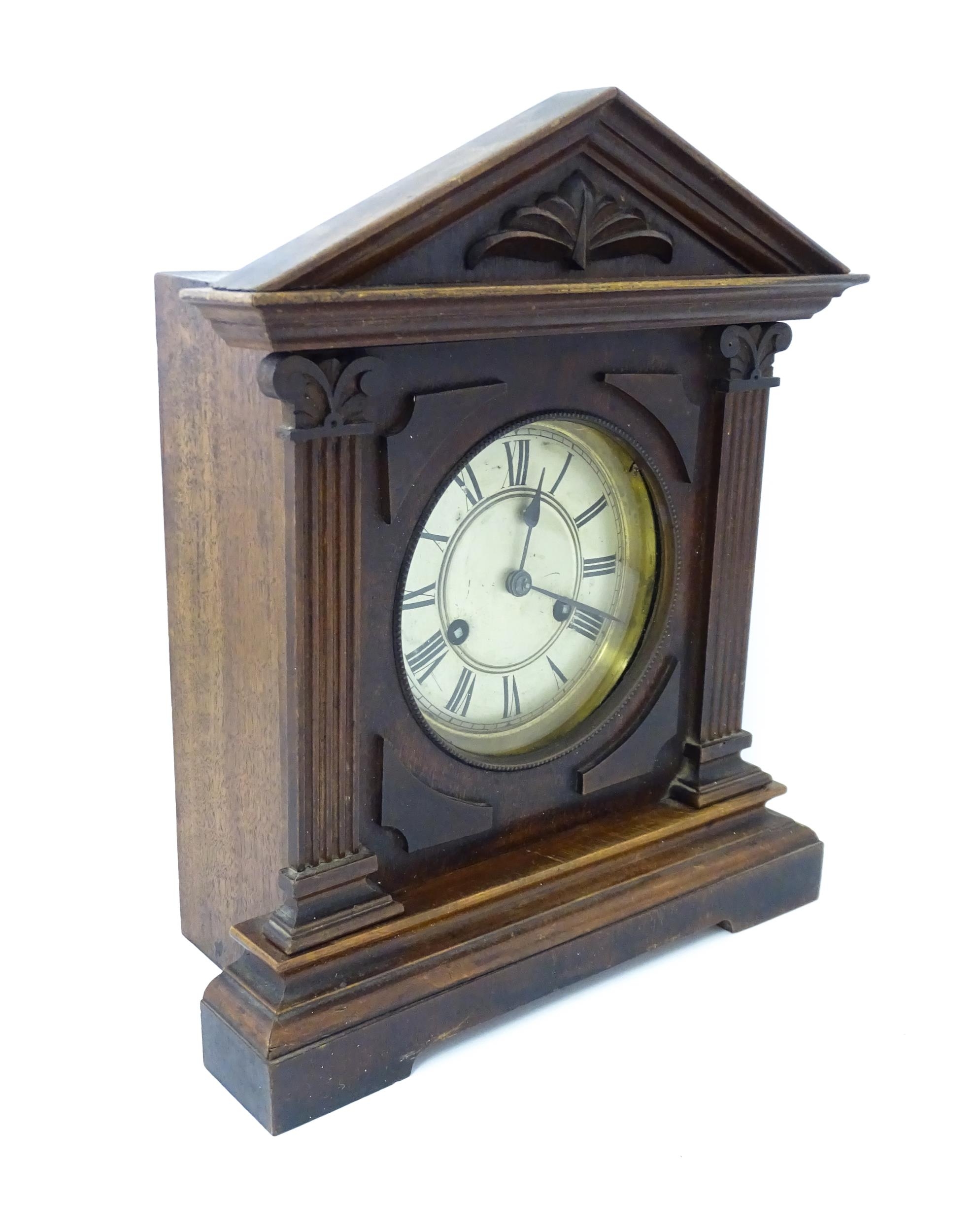 A late 19th/ early 20thC mahogany cased mantle clock by Philipp Haas & Sohne. The white enamel - Image 4 of 10