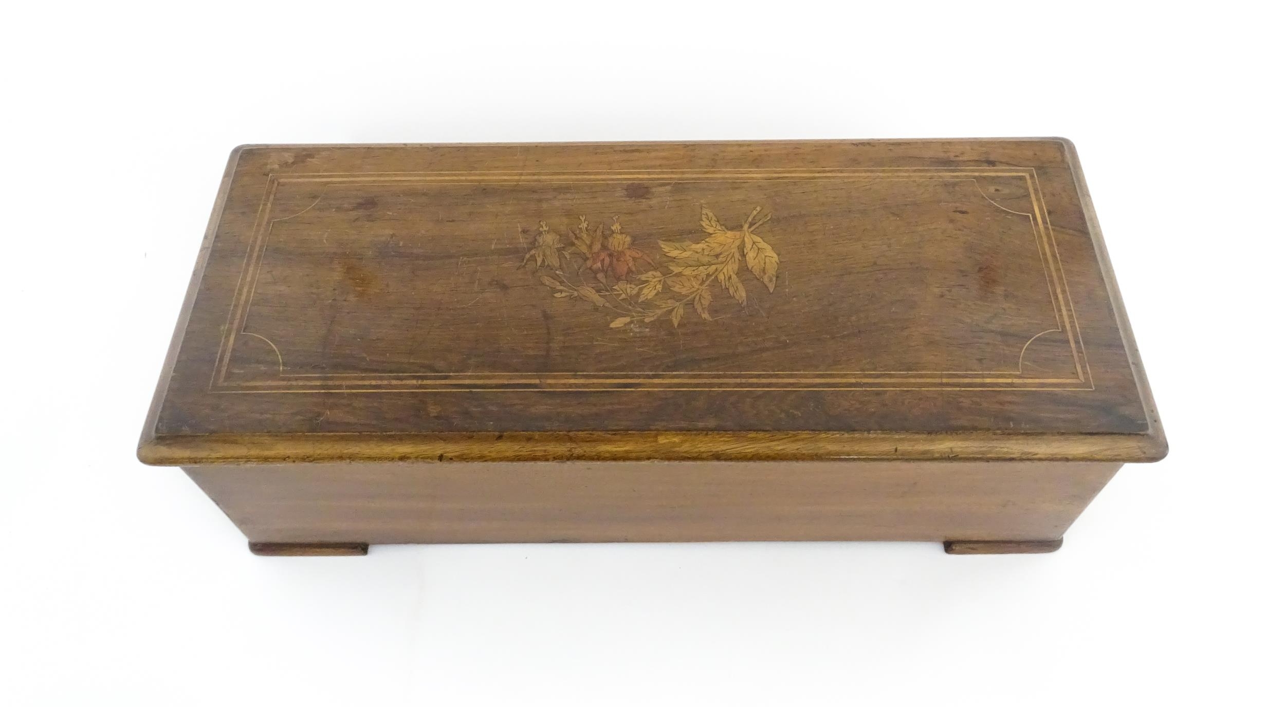 A 19thC Swiss rosewood music box with marquetry inlaid decoration to lid, playing 10 airs, by PVF of - Image 9 of 13