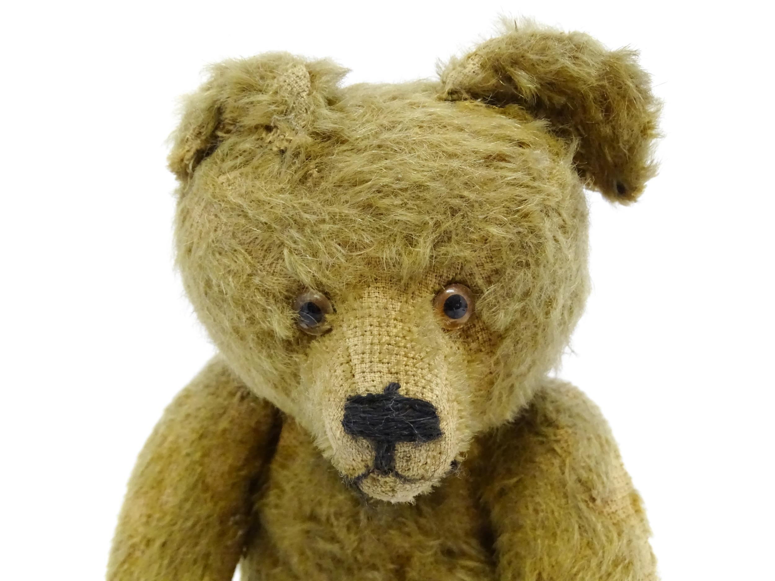 Toy: An early 20thC mohair straw filled teddy bear with proud nose, stitched mouth, hump back, - Image 8 of 9