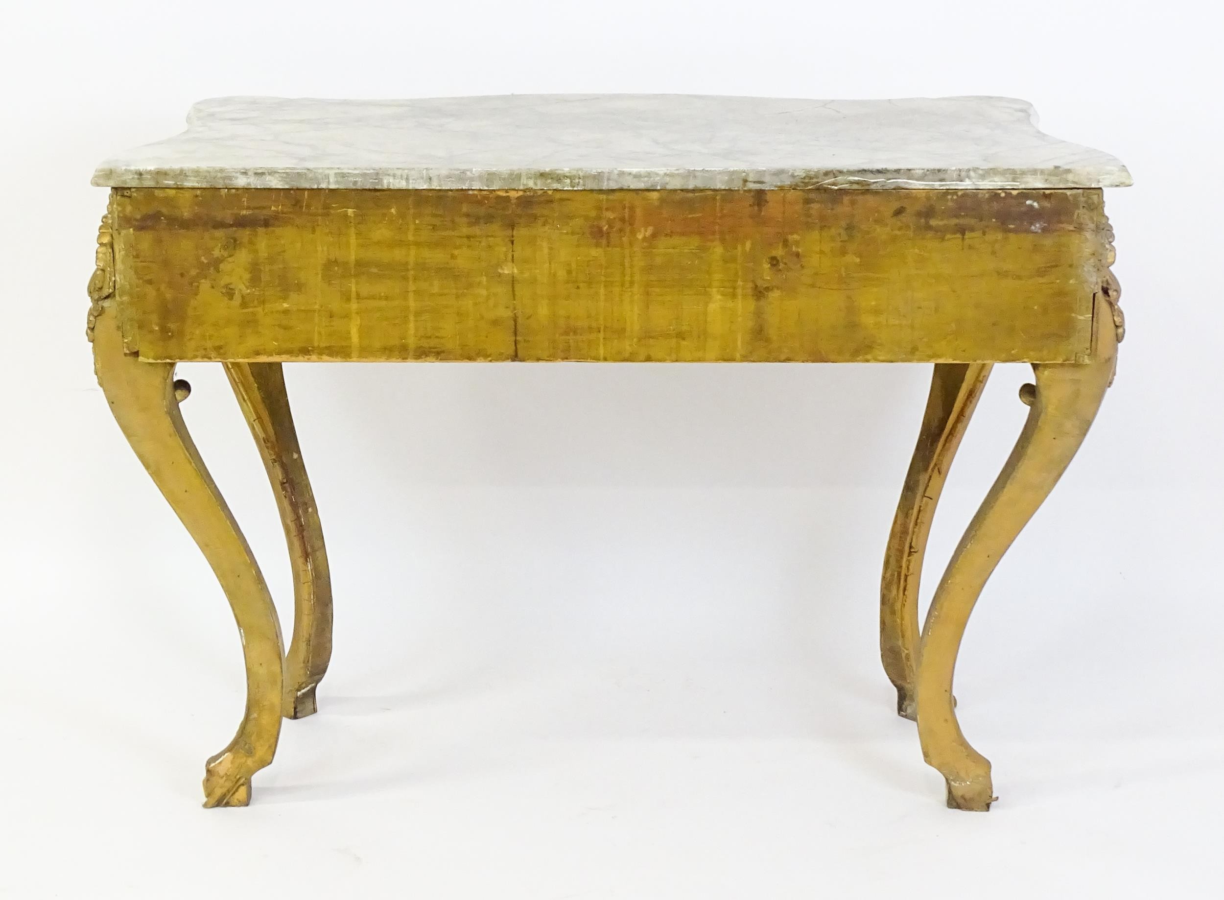 A 19thC marble topped table with a gesso and giltwood moulded base, decorated with shells, - Image 8 of 8