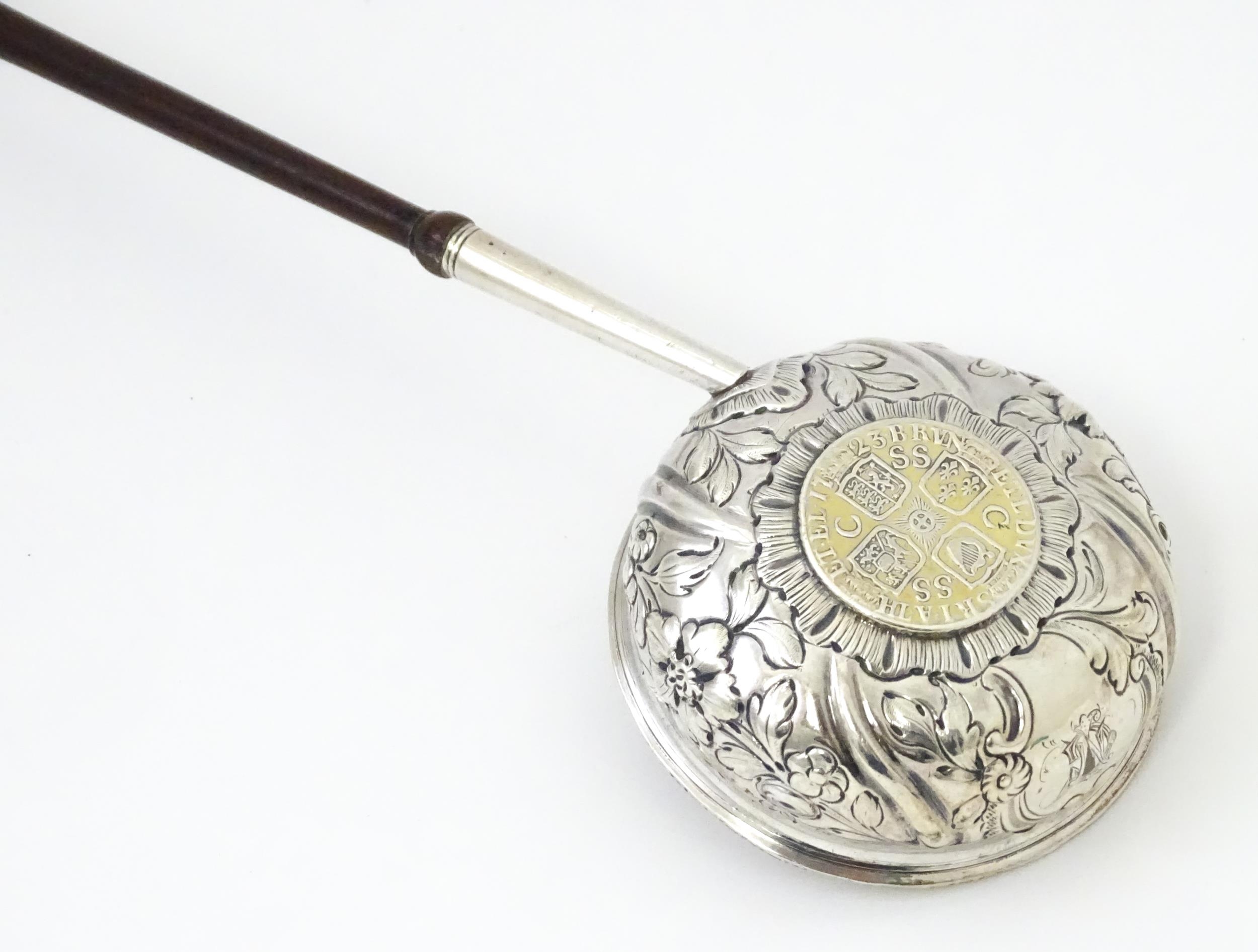 A white metal punch ladle with coin style detail to bowl. Approx 11" long overall Please Note - we - Image 5 of 6