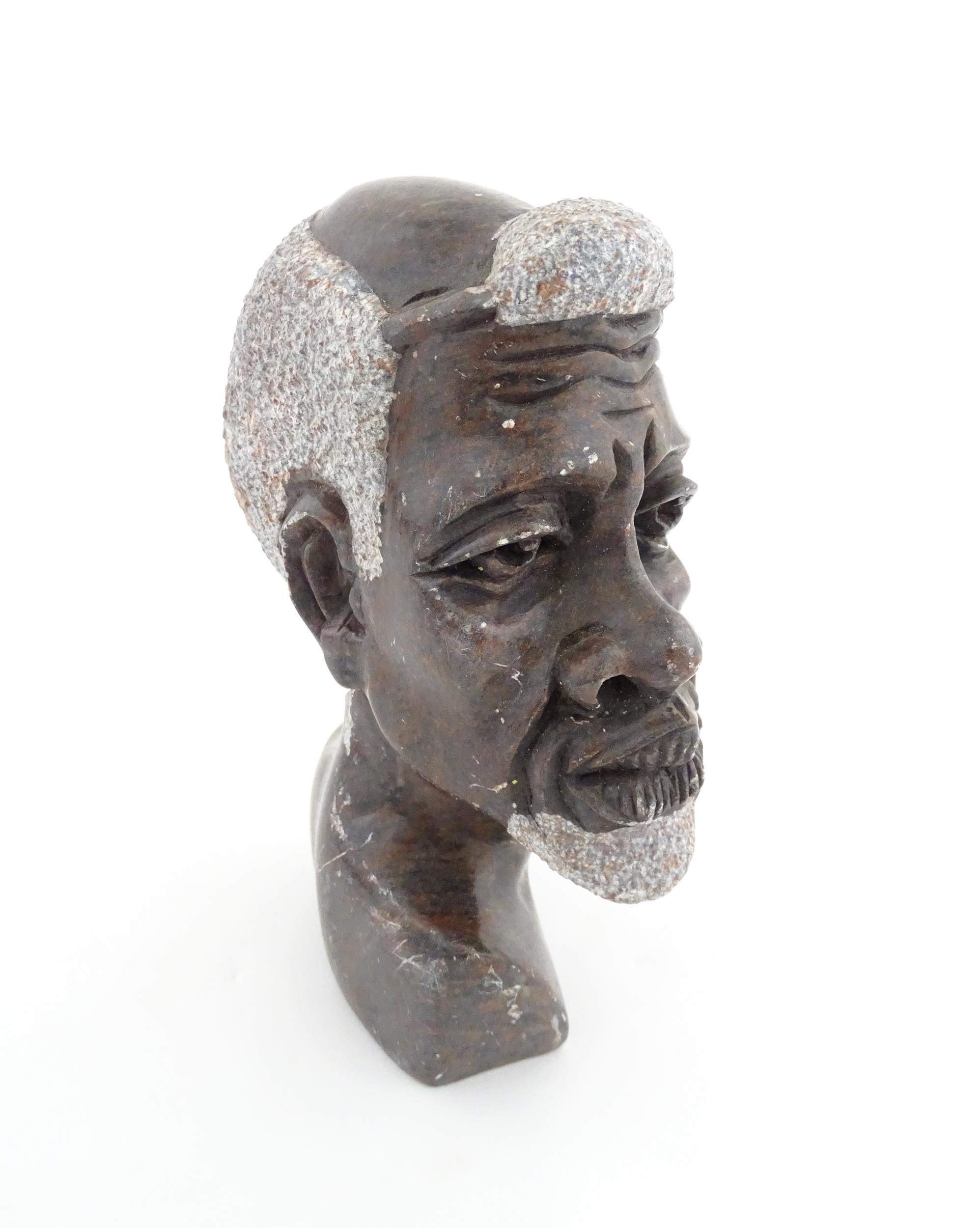 Ethnographic / Native / Tribal : An African carved soapstone bust modelled as the head of a - Image 5 of 7