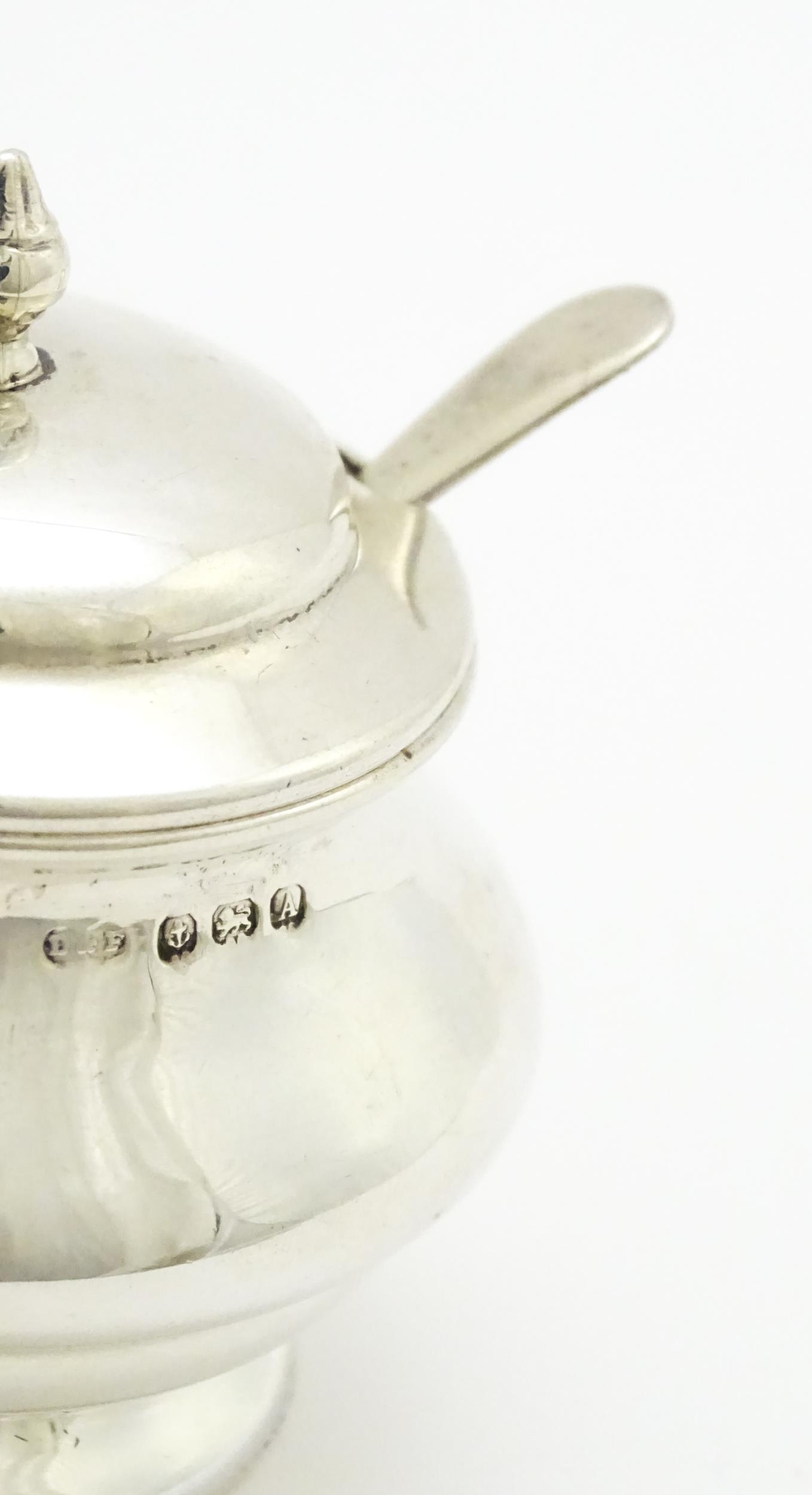 A matched four piece silver cruet set comprising pepper, mustard with spoon and two salts with - Image 2 of 12