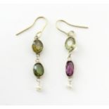 Gilt metal drop earrings set with coloured tourmalines. Approx 1 1/4" long Please Note - we do not