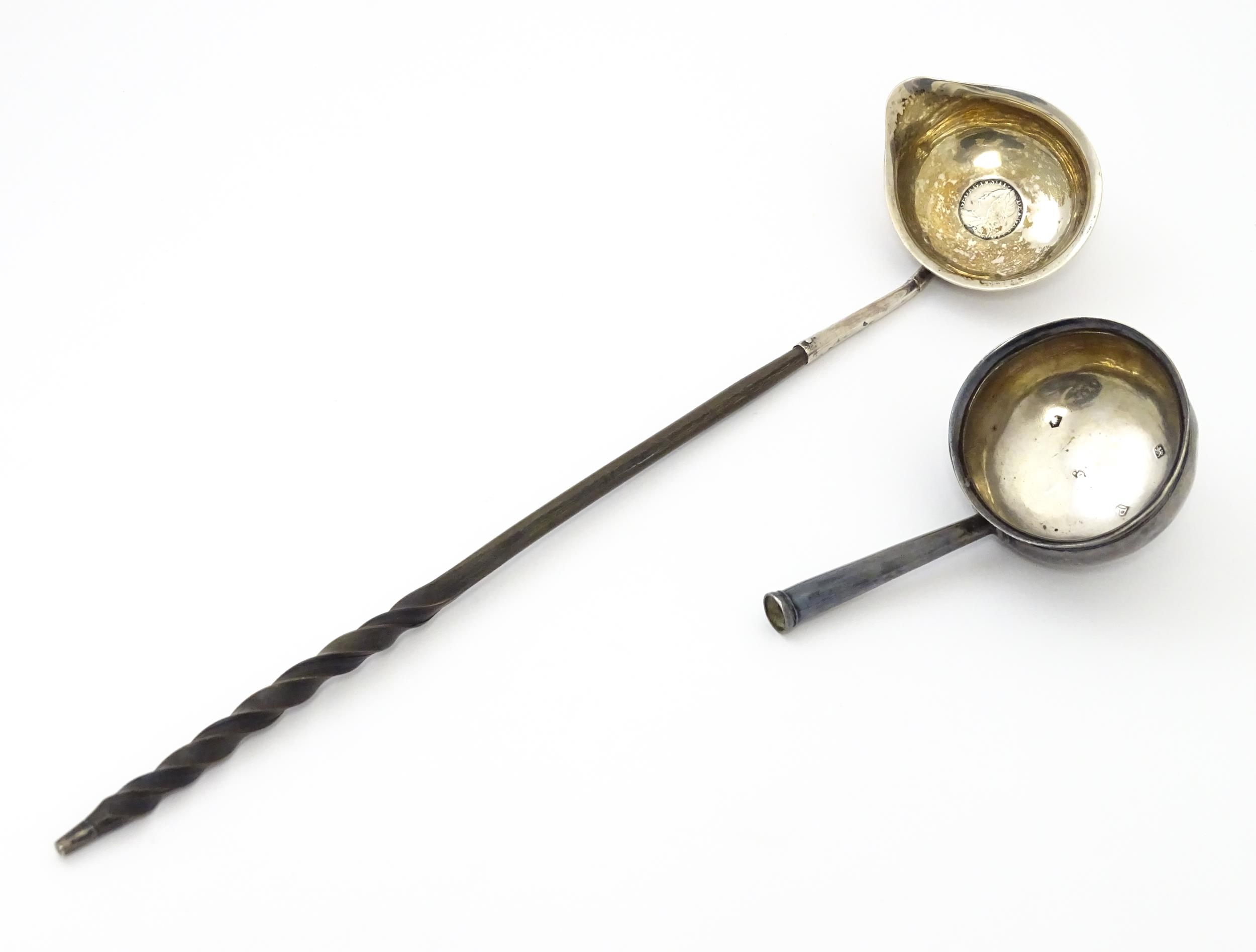 An 18thC toddy ladle with silver bowl hallmarked London 1794 maker Peter and Ann Bateman, together