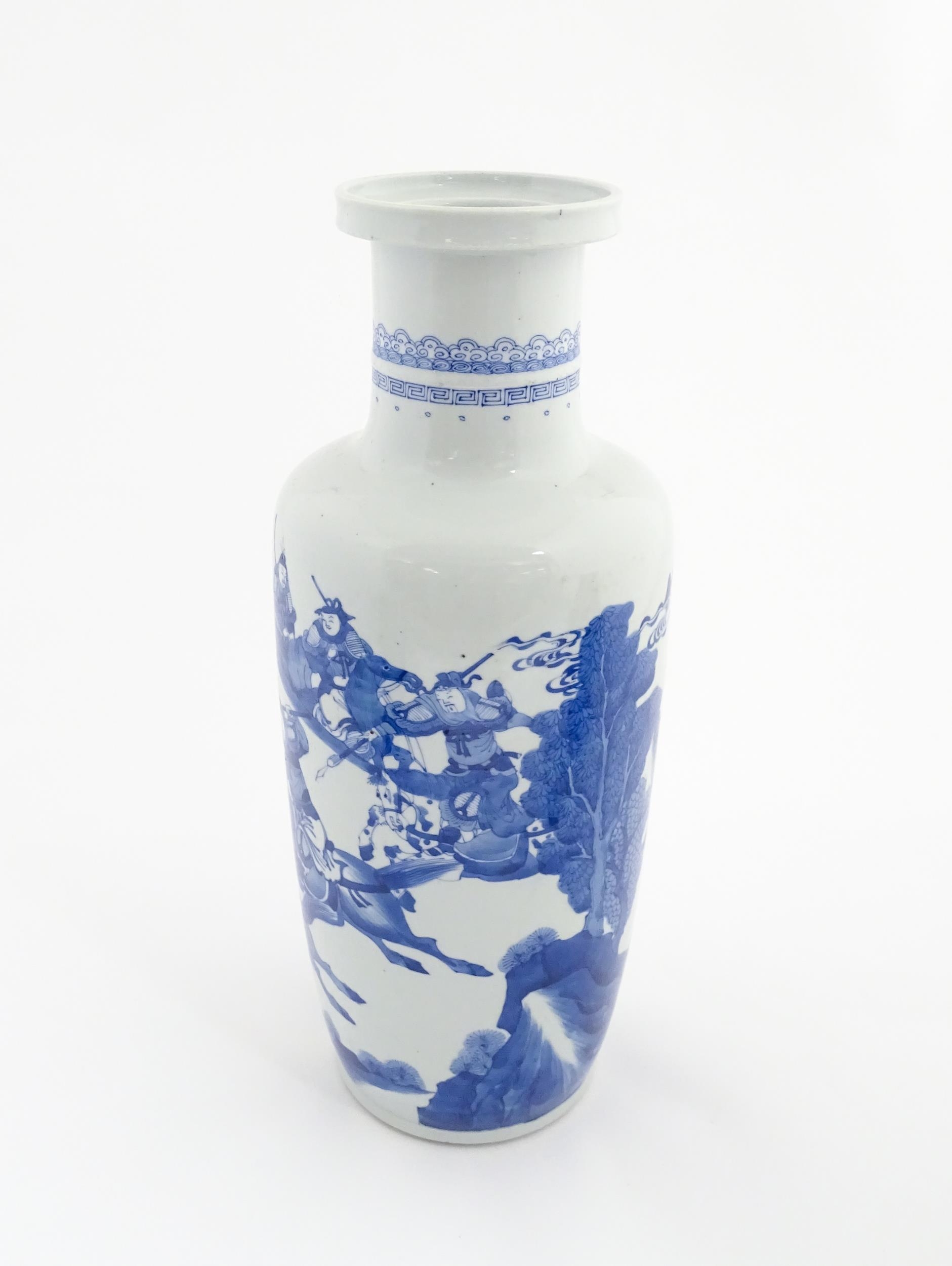 A Chinese blue and white vase decorated with warriors and horses in a landscape. Character marks - Image 7 of 9