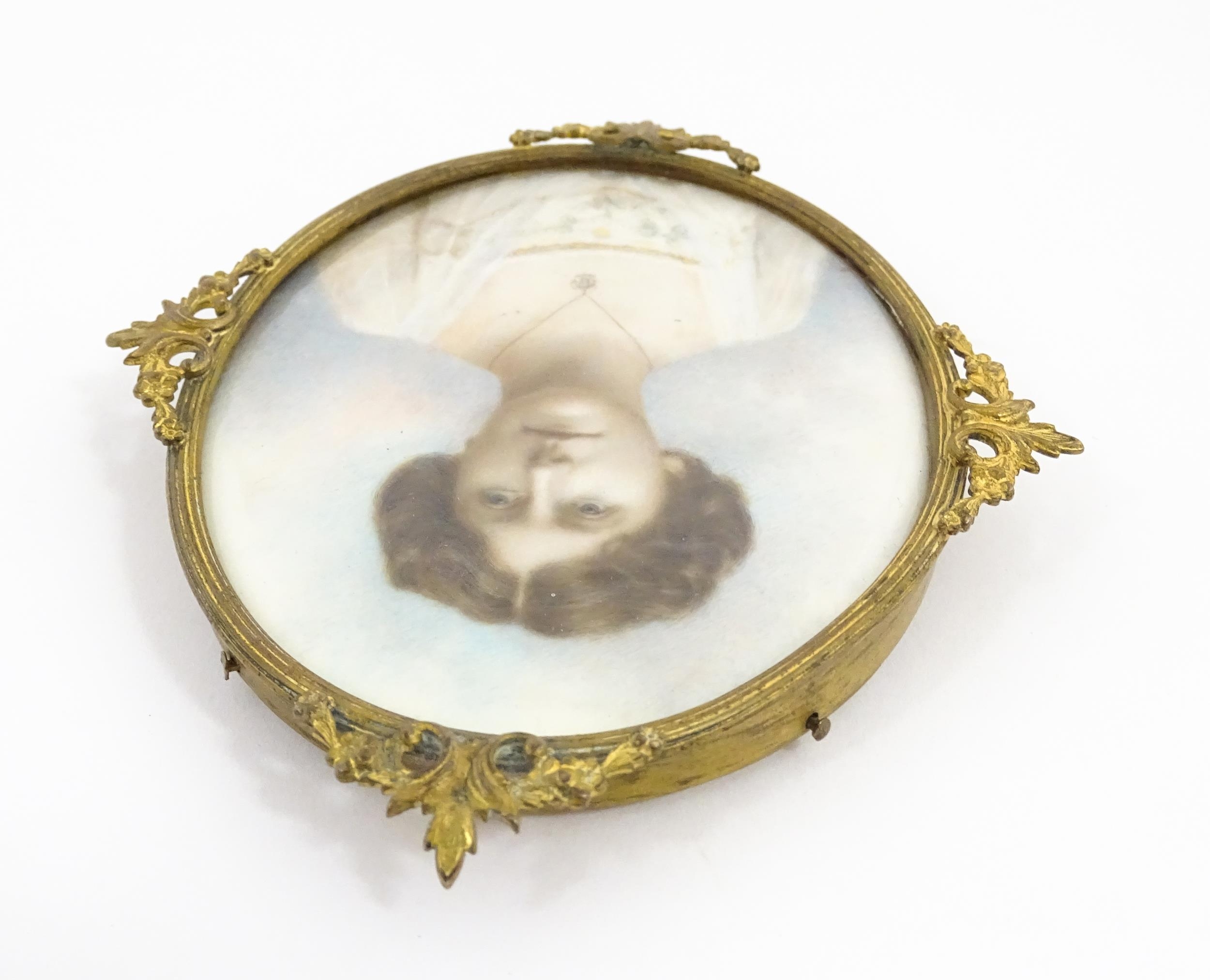 A 19thC watercolour portrait miniature depicting a young lady wearing a white dress with floral - Image 5 of 9