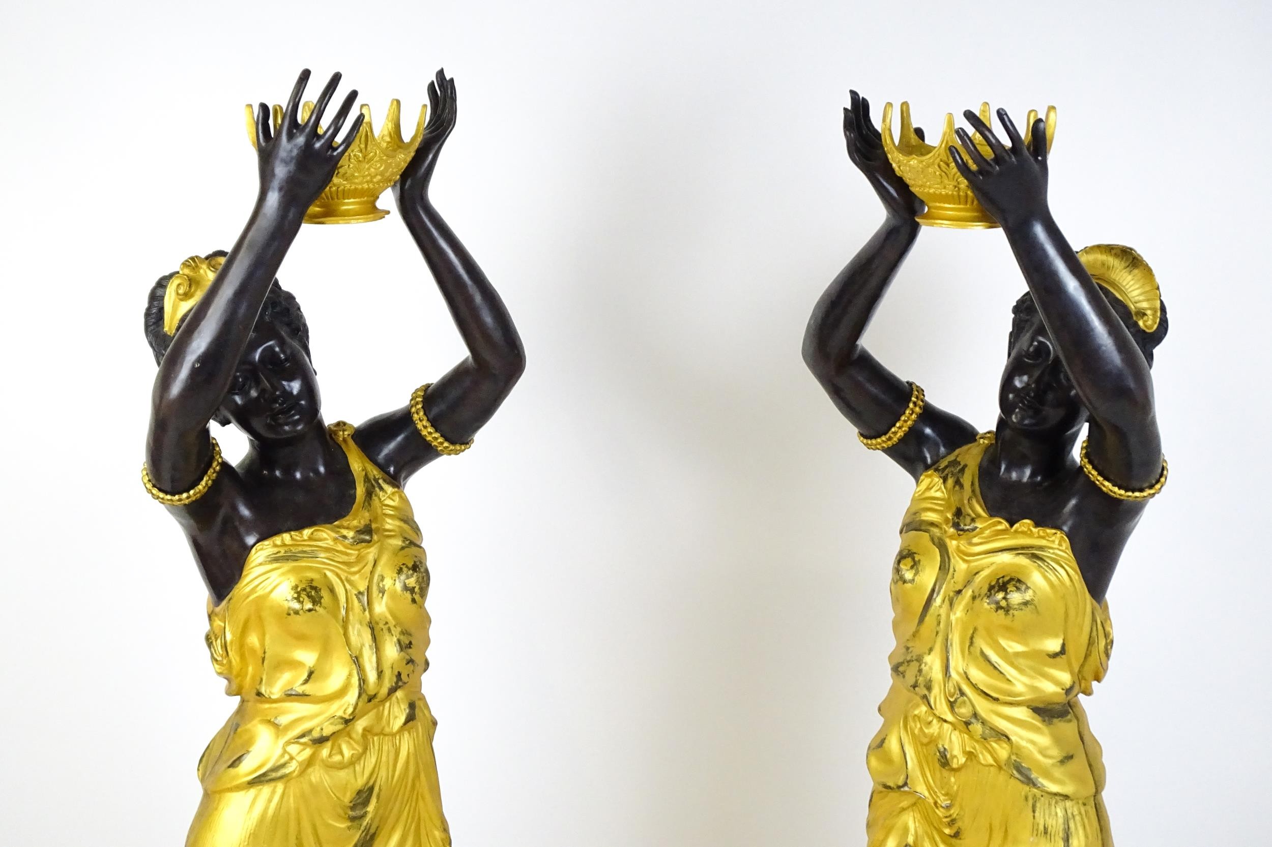 A pair of large cast bronze female blackamoor torcheres with gilt detail, raised on marble - Image 3 of 15