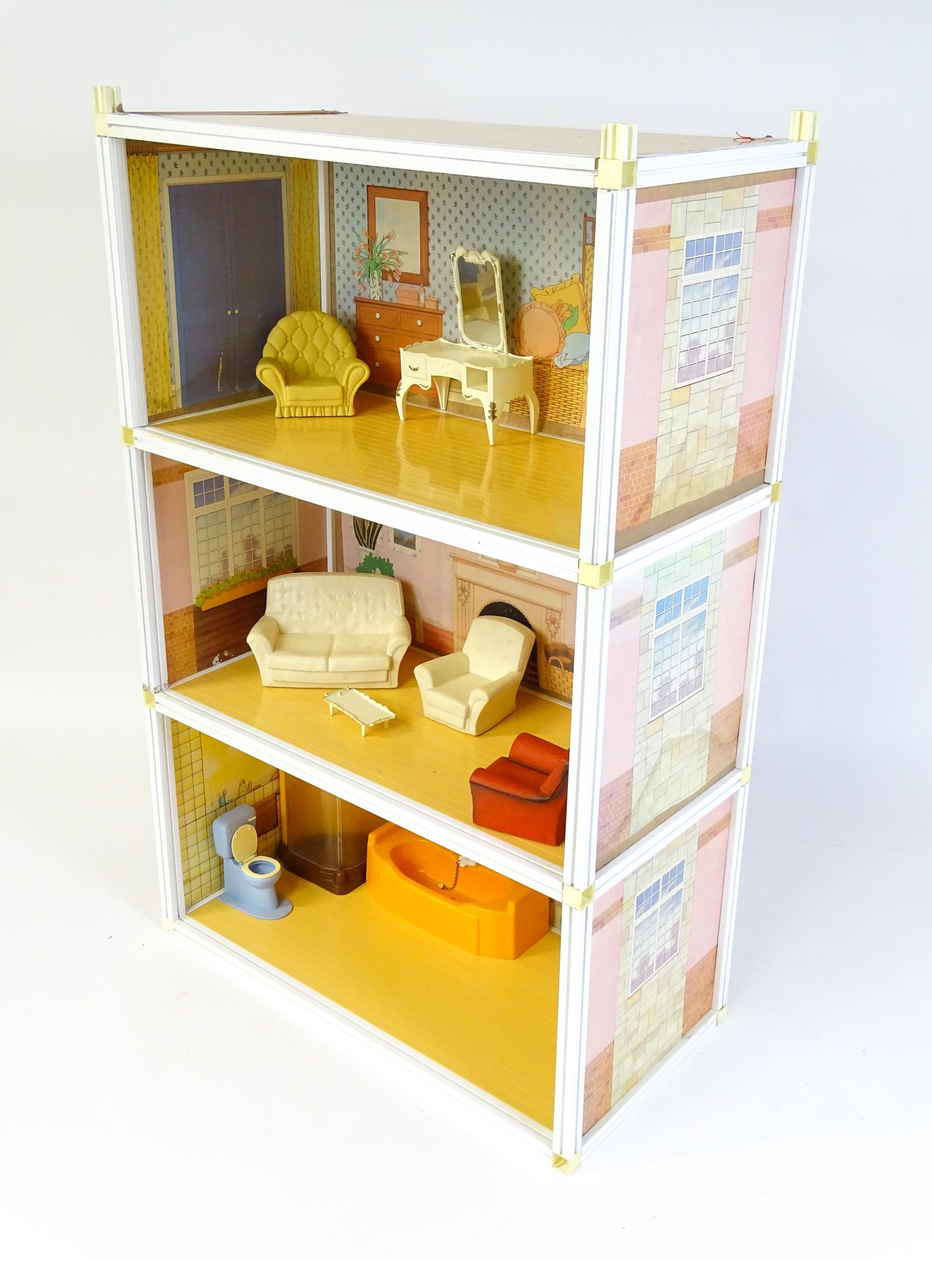 Toys: A 20thC Sindy three storey dolls house with open front, with Sindy furniture to include - Image 19 of 21