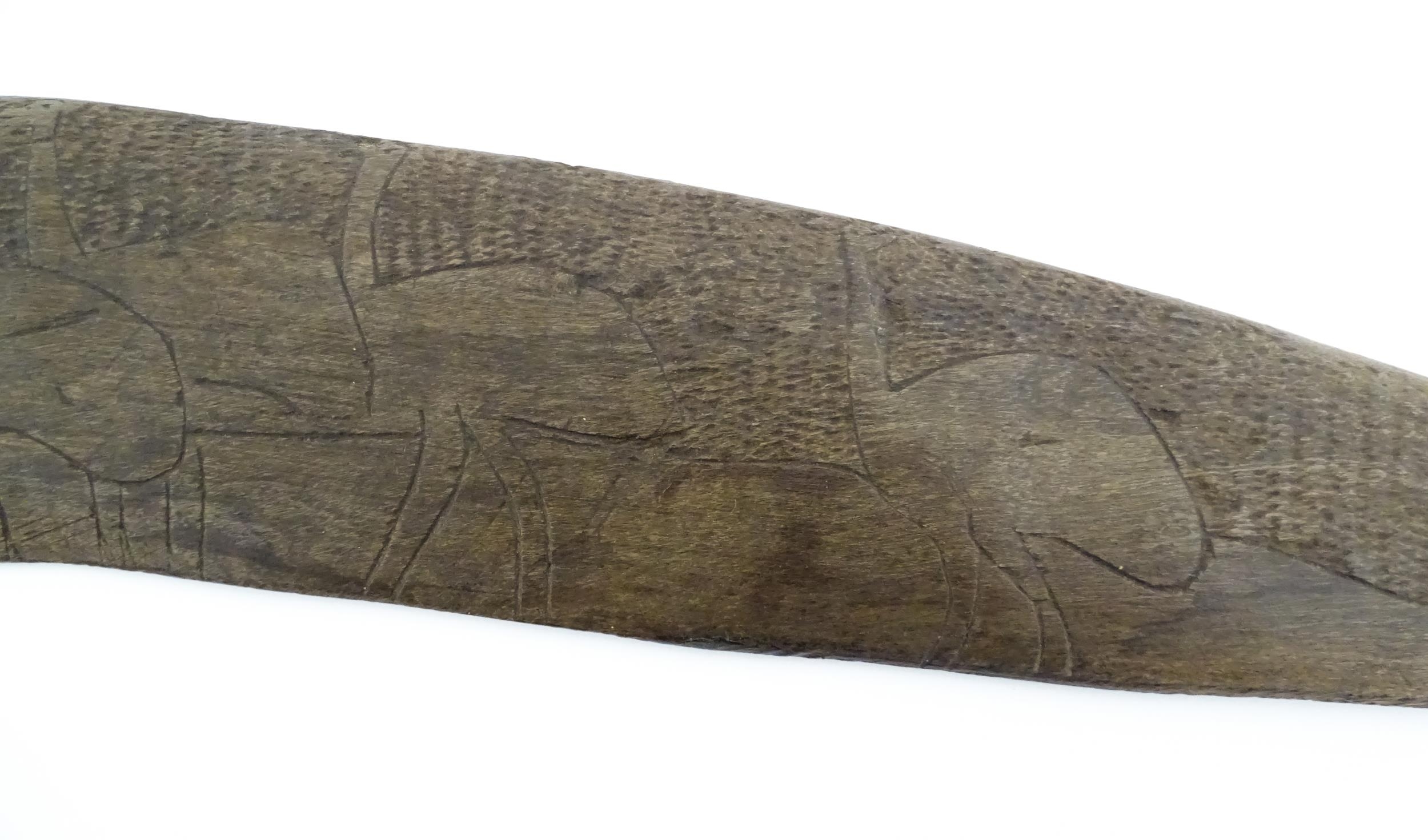 Ethnographic / Native / Tribal : A large Australian carved wooden boomerang with engraved decoration - Image 3 of 8