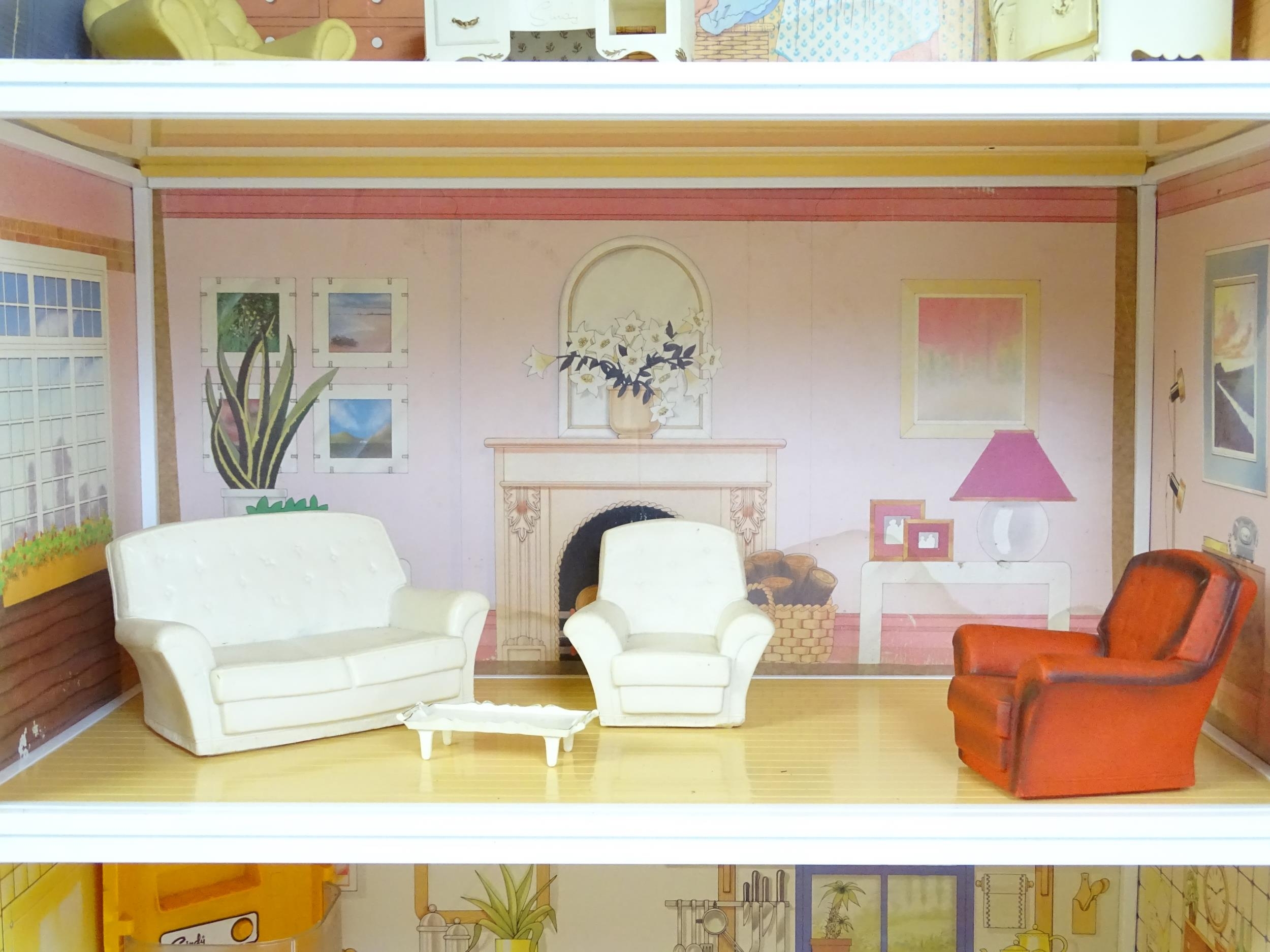 Toys: A 20thC Sindy three storey dolls house with open front, with Sindy furniture to include - Image 4 of 21