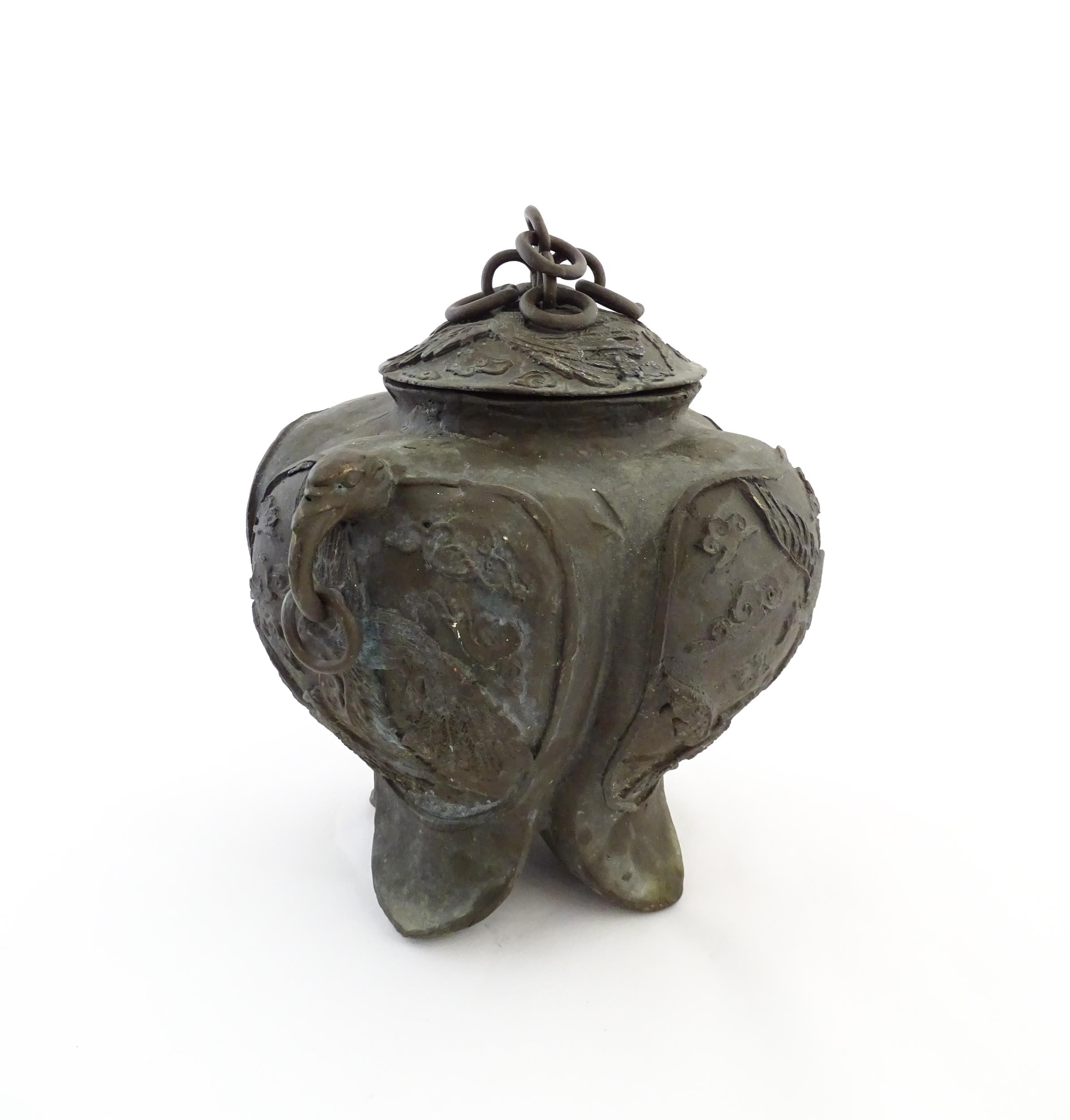 A Chinese cast vessel of lobed form with twin ring handles modelled as elephant heads, the body - Image 6 of 9