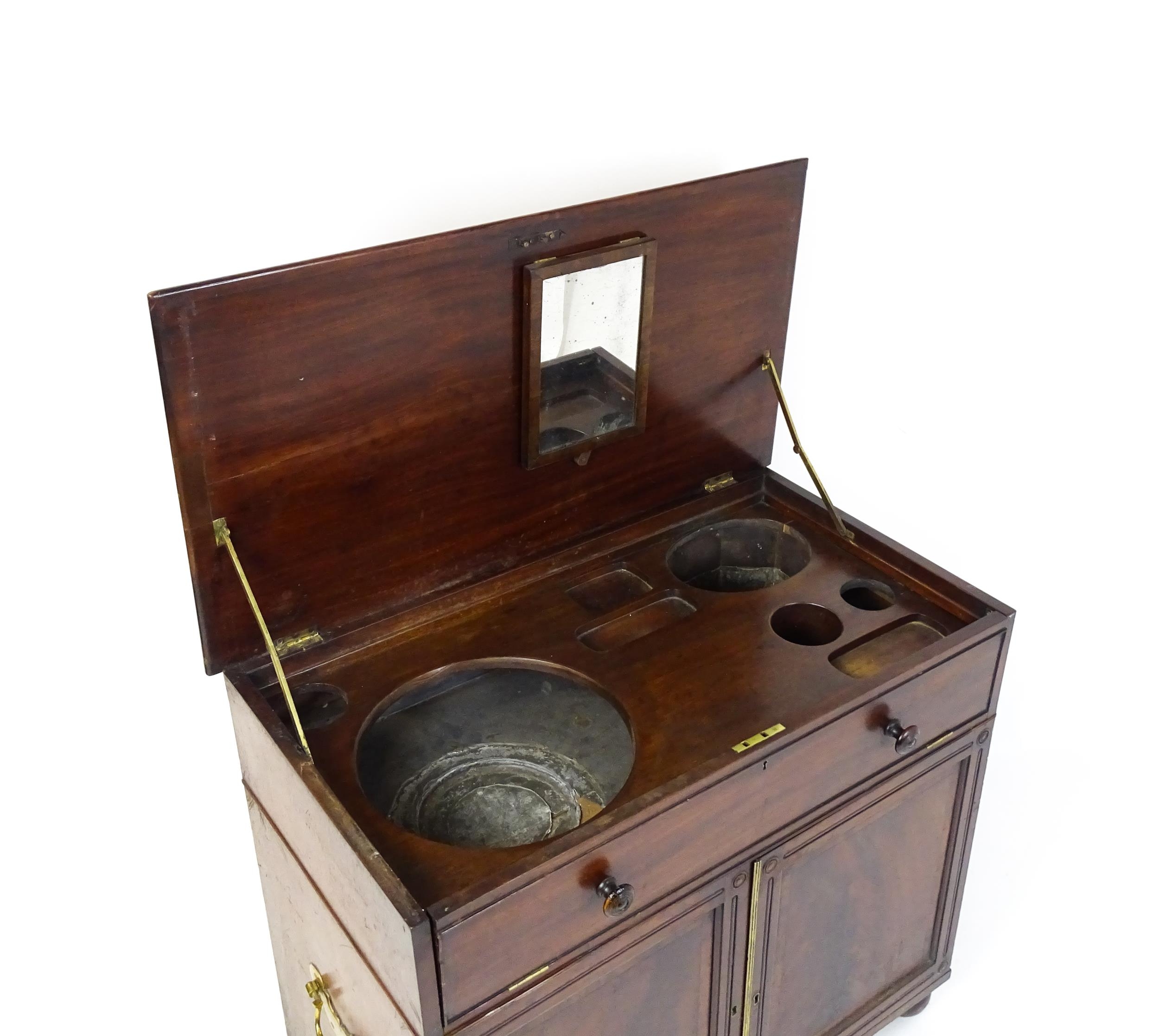 A Georgian mahogany campaign washstand with a mirror to the interior and sections for internal - Image 7 of 11