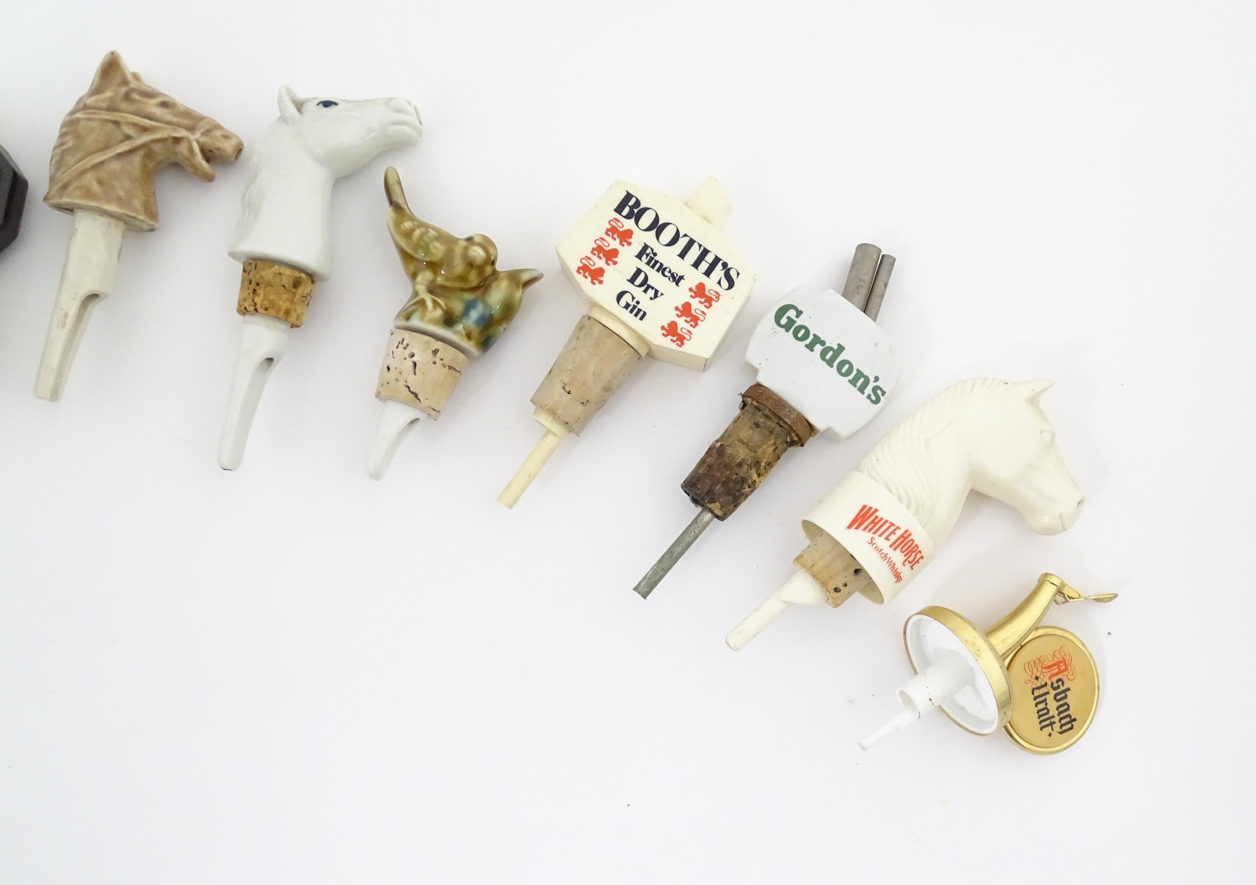 Breweriana : A quantity of assorted 20thC advertising bottle stoppers / pourers to include Booth's - Image 8 of 16