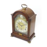 A 20th century mahogany cased Elliott 8-day chiming mantel clock, retailed by Garrard & Co of