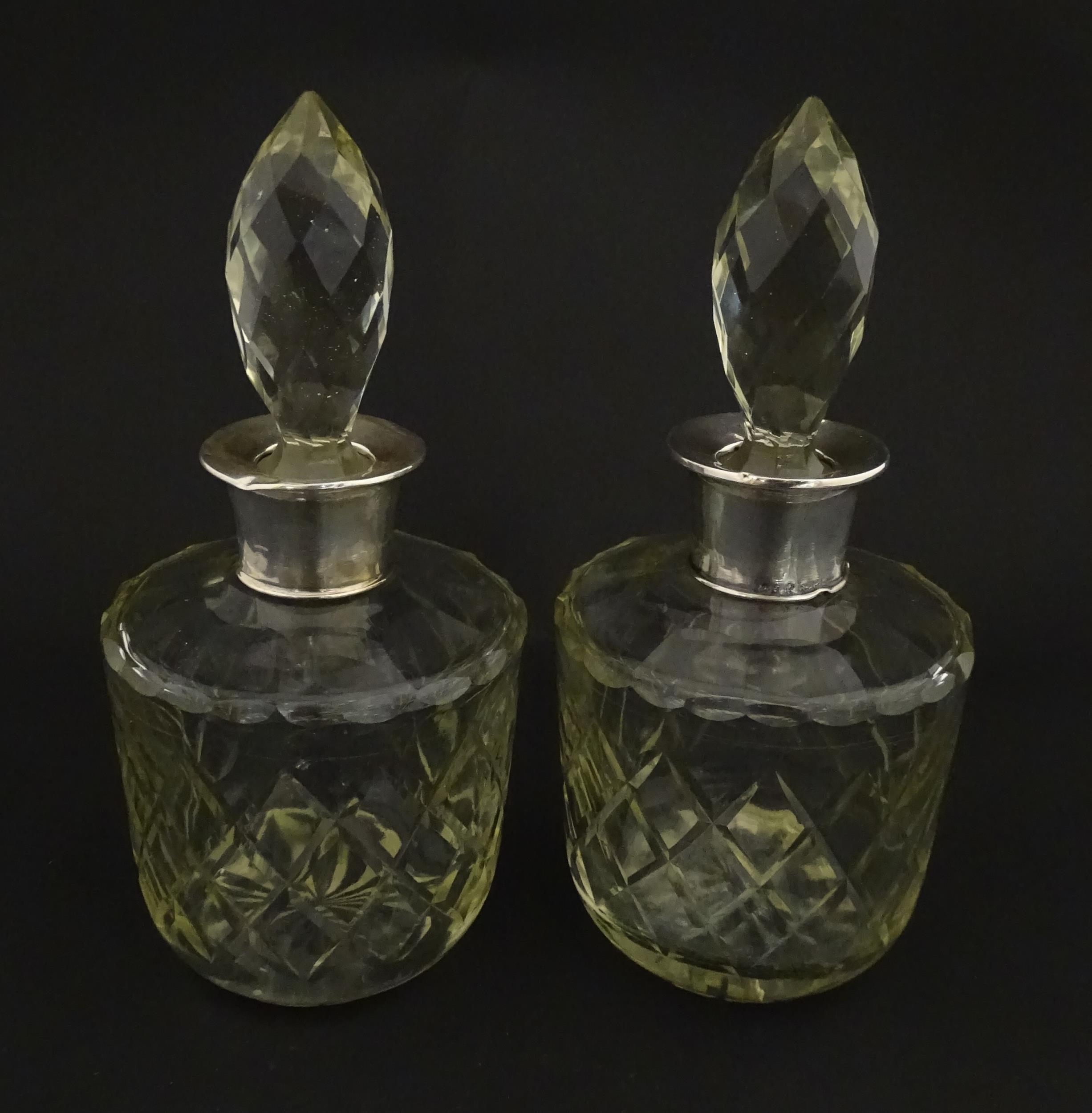 Two glass flasks formed as small cut glass decanters with Argentinian .925 silver mounts. Approx. 8" - Image 4 of 10