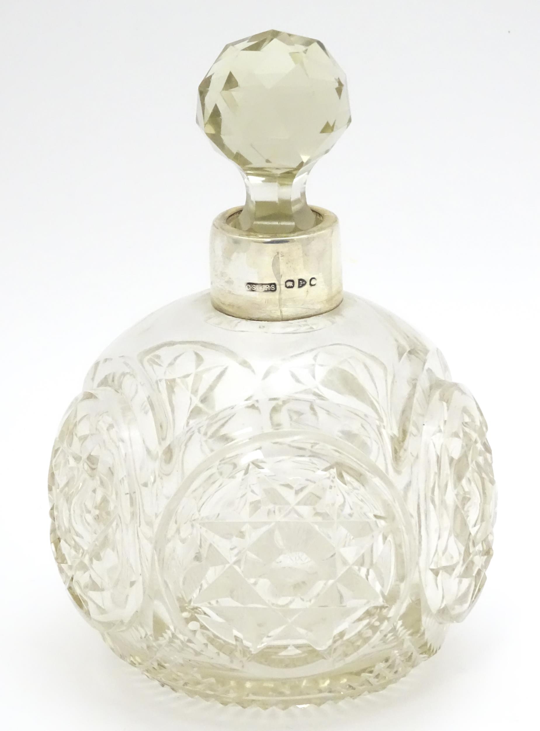 A Victorian cut glass scent / perfume bottle with silver mounts hallmarked Chester 1897, maker - Image 4 of 6