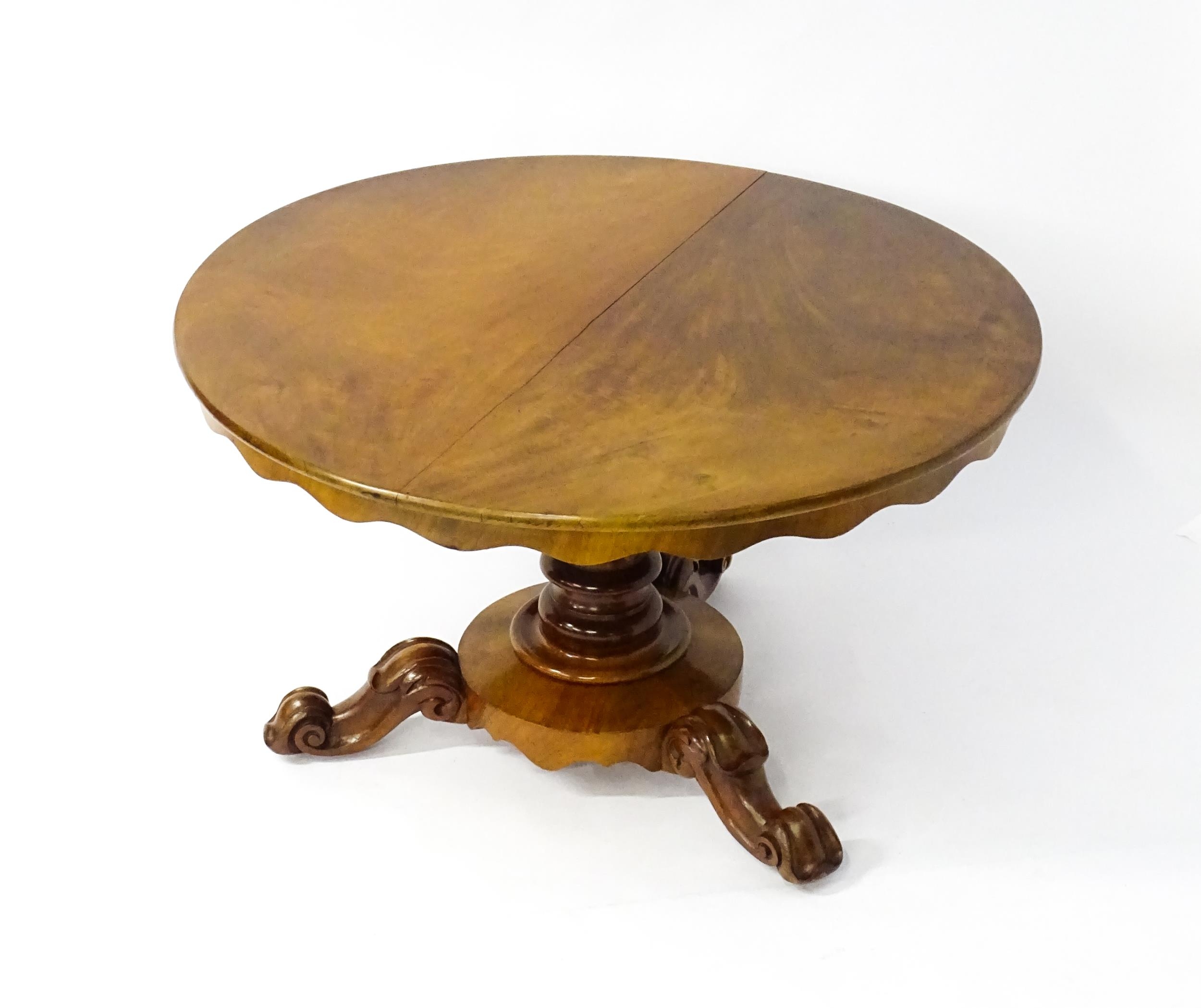 A 19thC mahogany tilt top breakfast table with a carved frieze above a turned and carved pedestal - Image 10 of 11