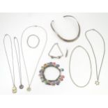 A quantity of assorted silver and white metal jewellery to include necklaces, pendants, charm