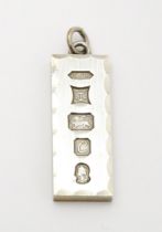 A silver pendant of ingot form hallmarked Birmingham 1977 with Silver Jubilee mark. Approx. 1 7/8"