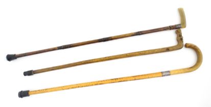 Three assorted Victorian and later walking sticks / canes, one with a horn handle and silver